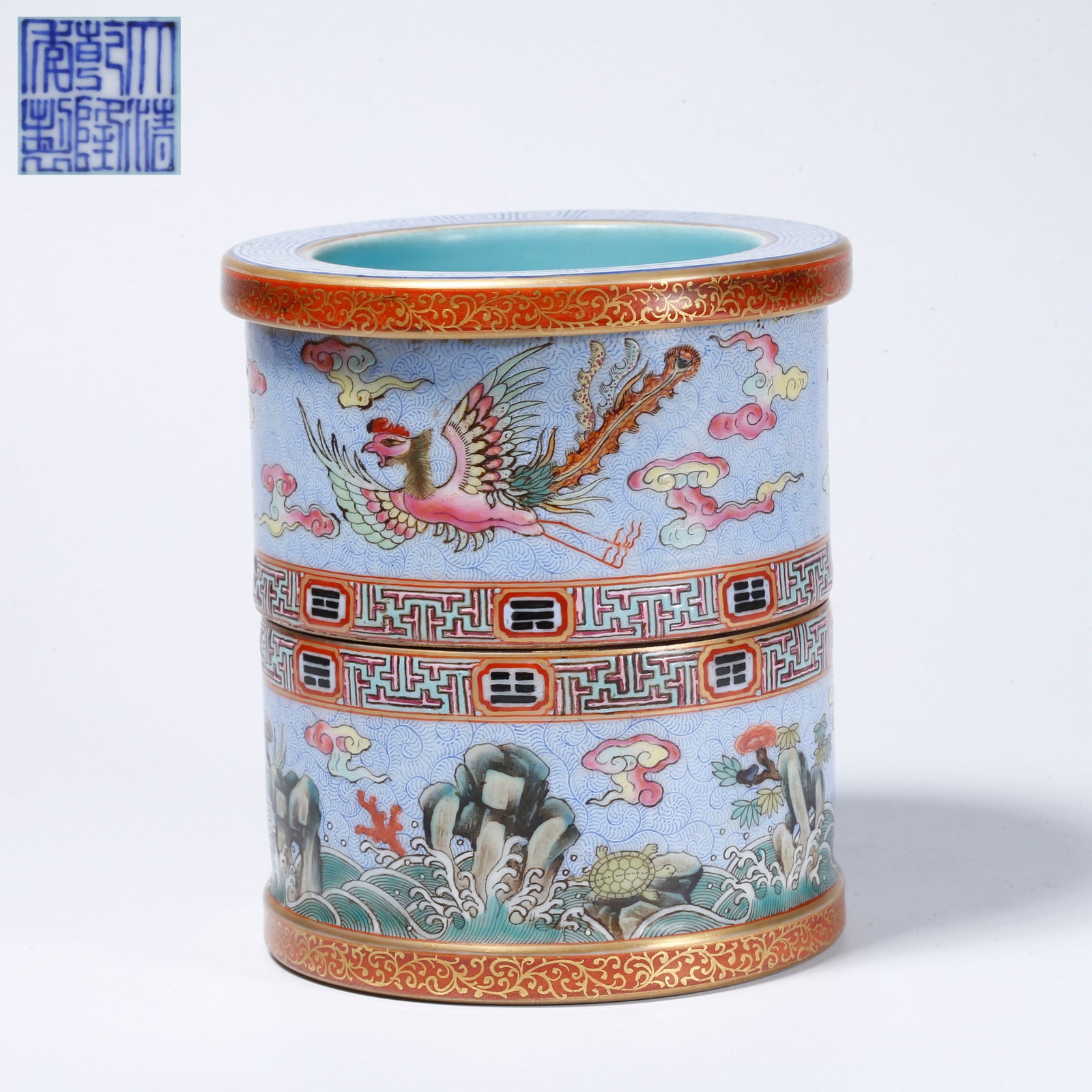 A FAMILLE ROSE BRUSH POT WITH AUSPICIOUS BEAST MOTIF: Famille rose brush pot with auspicious beast motif