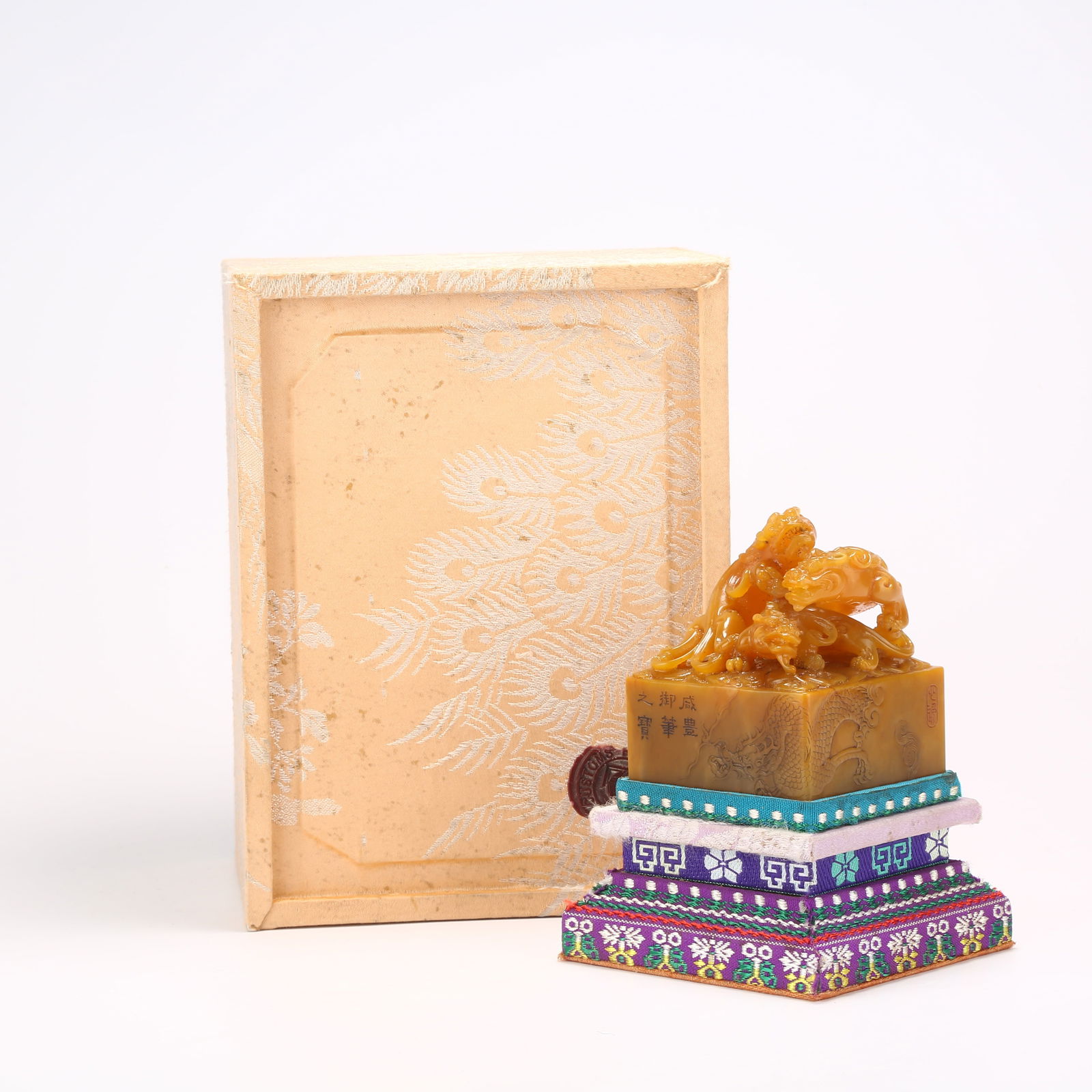 A SHOUSHAN TIANHUANG STONE SEAL WITH CHILONG KNOB: Shoushan Tianhuang Stone Seal with Chilong Knob