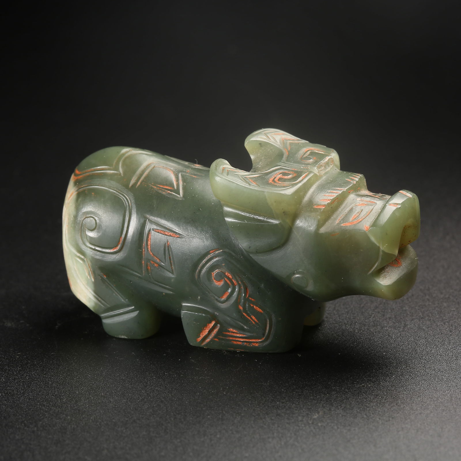 A ARCHAIC JADE RECUMBENT OX ORNAMENT (1 of 8)