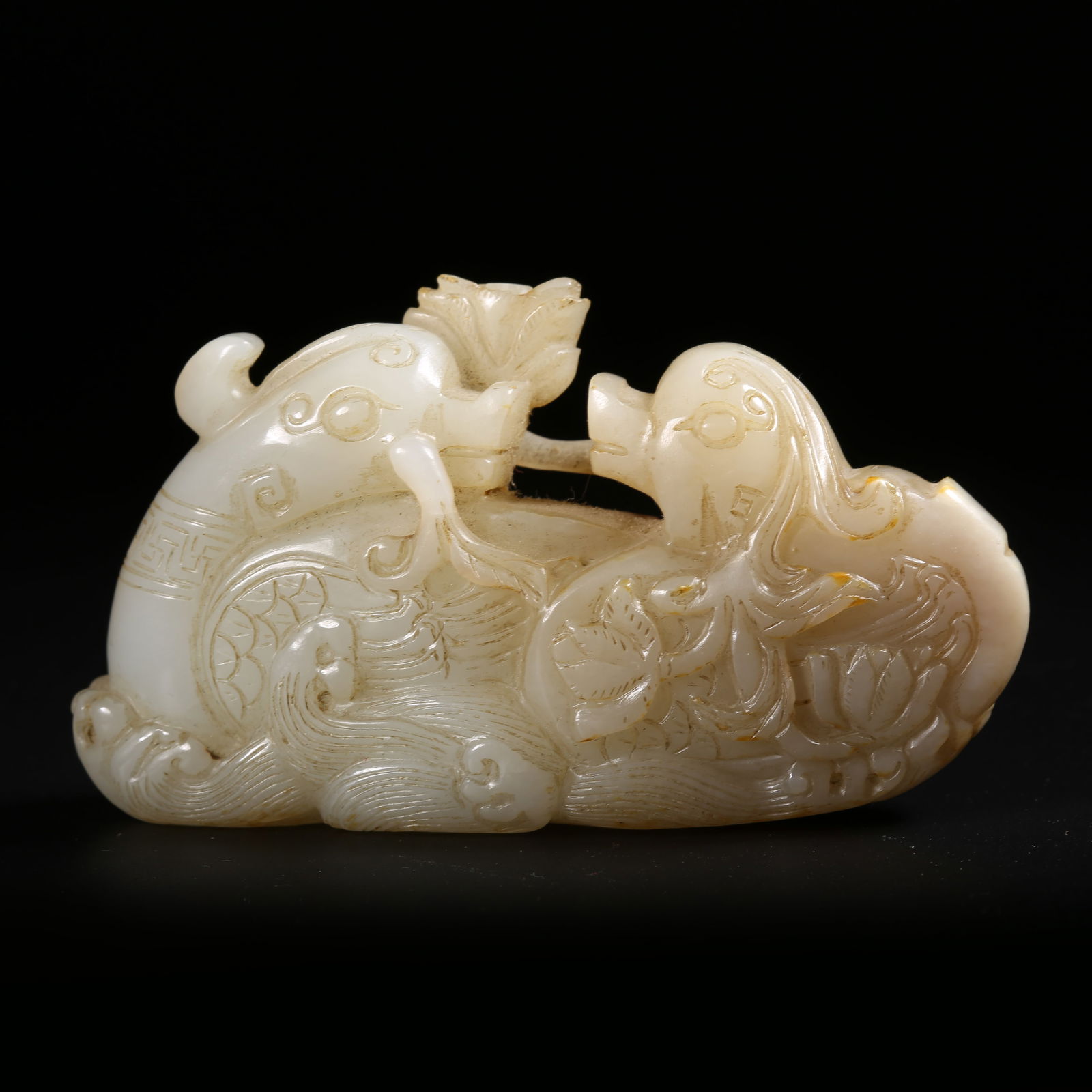 A HETIAN JADE ORNAMENT OF MANDARIN DUCKS IN A LOTUS POND (1 of 8)