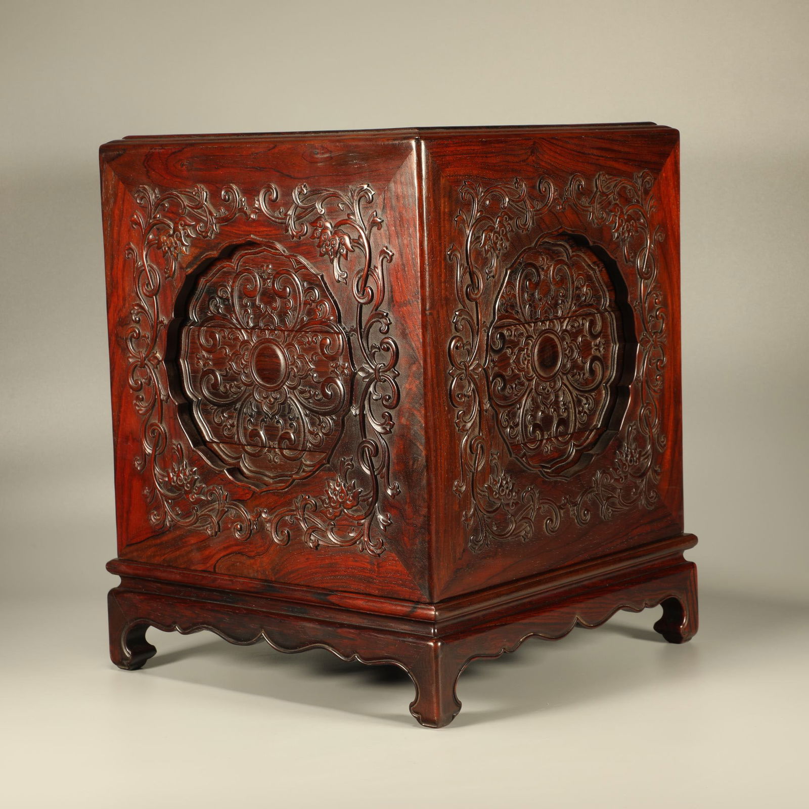 A HUANGHUALI CARVED CONTINUOUS-FLOWER PATTERN NESTED BOXES (1 of 6)