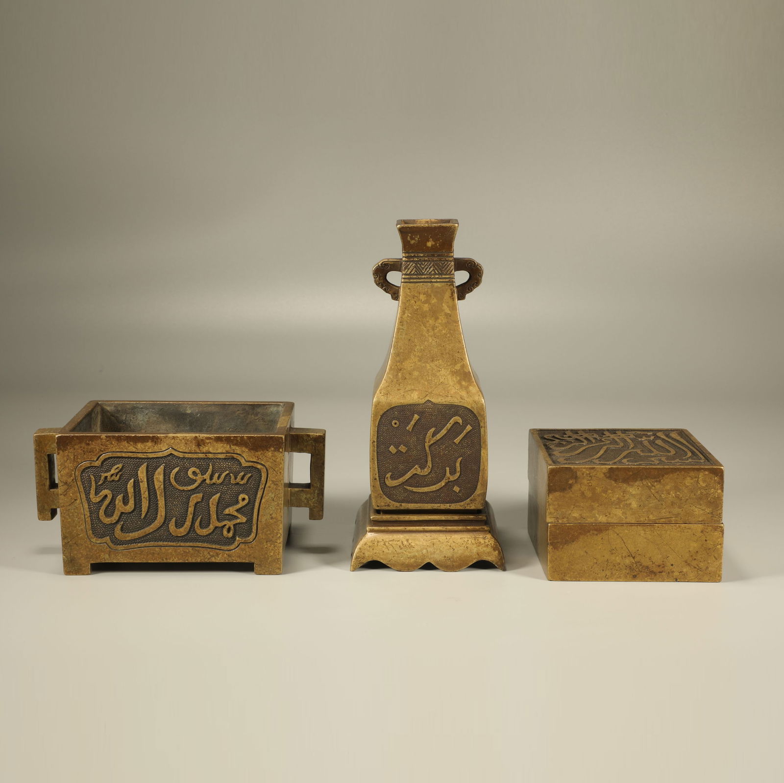 A SET OF THREE BRONZE AWAMORI CENSERS WITH BOXES (1 of 6)