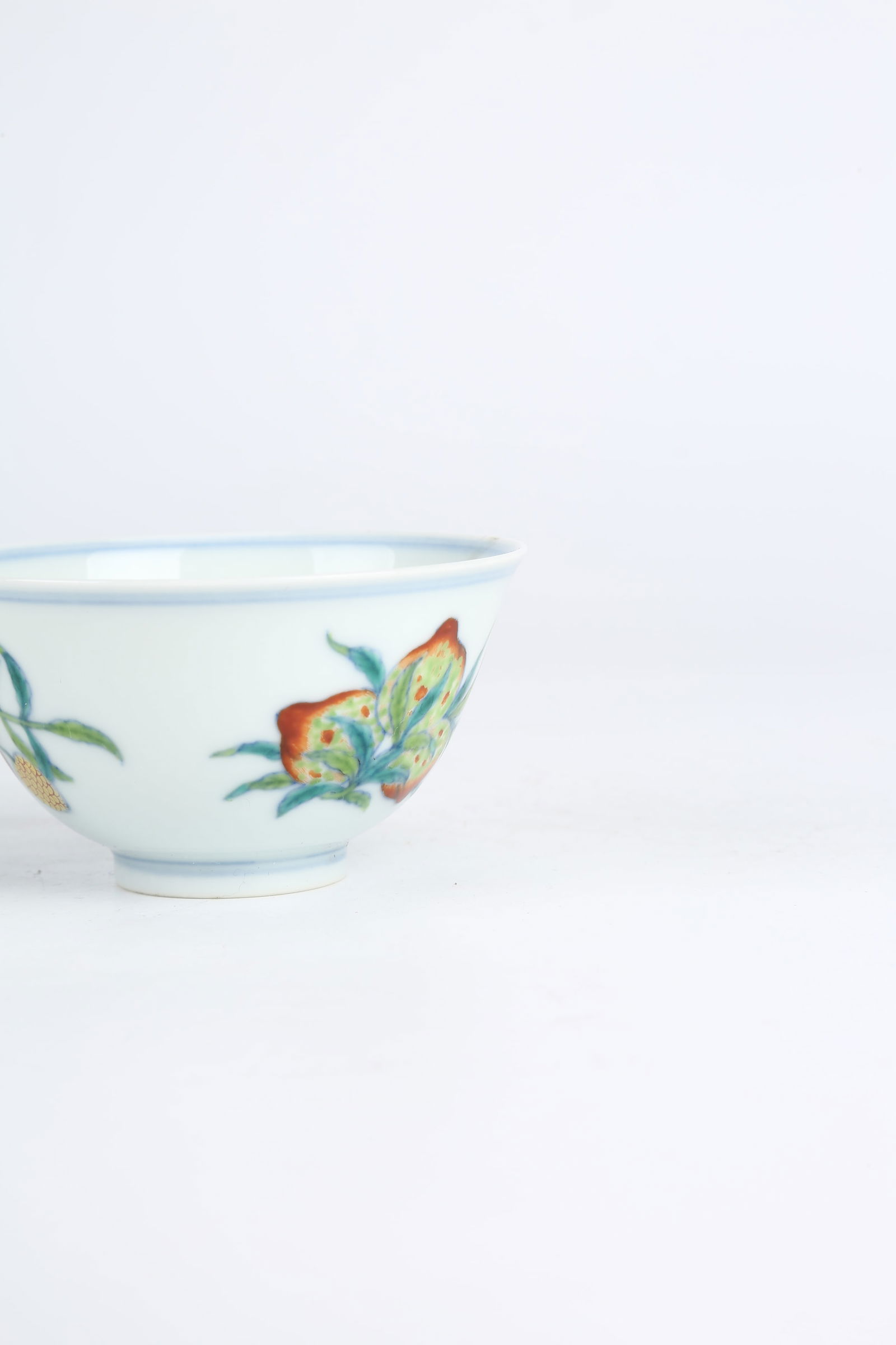 A DOUCAI "THREE ABUNDANCES" PATTERNED CUP - 5