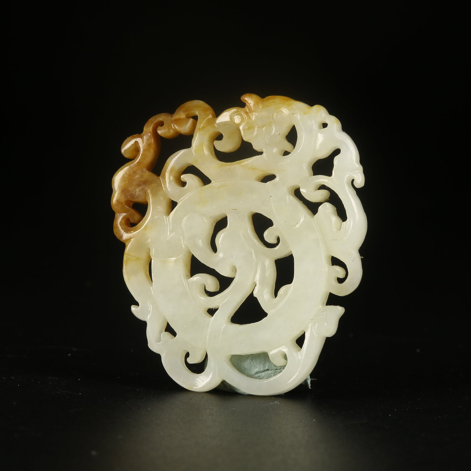 A HETIAN JADE DRAGON PATTERN PENDANT (1 of 9)