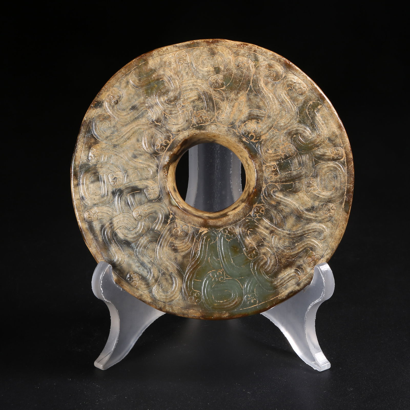 A ARCHAIC JADE DISC WITH DRAGON MOTIF (1 of 8)