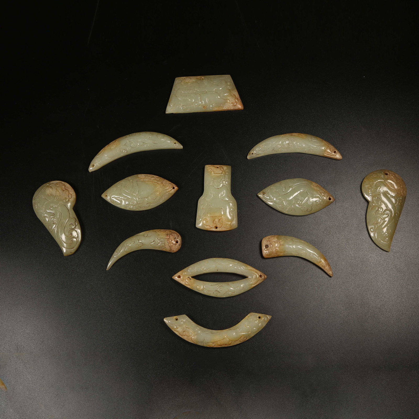 A ARCHAIC JADE PLAQUE WITH AUSPICIOUS BEAST DESIGN: Archaic Jade Plaque with Auspicious Beast Design