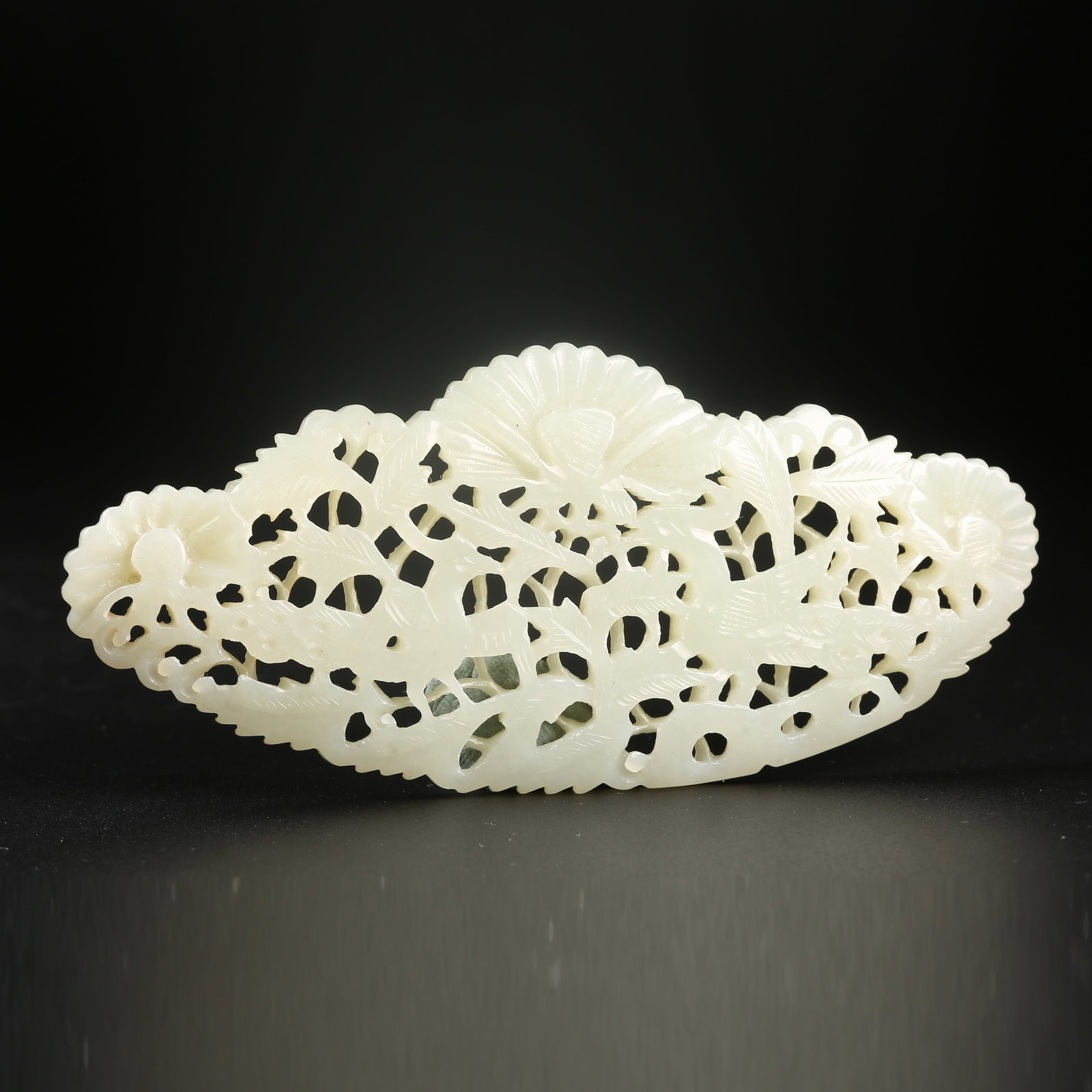 A HETIAN JADE PHOENIX PENDANT WITH FLORAL MOTIF (1 of 8)