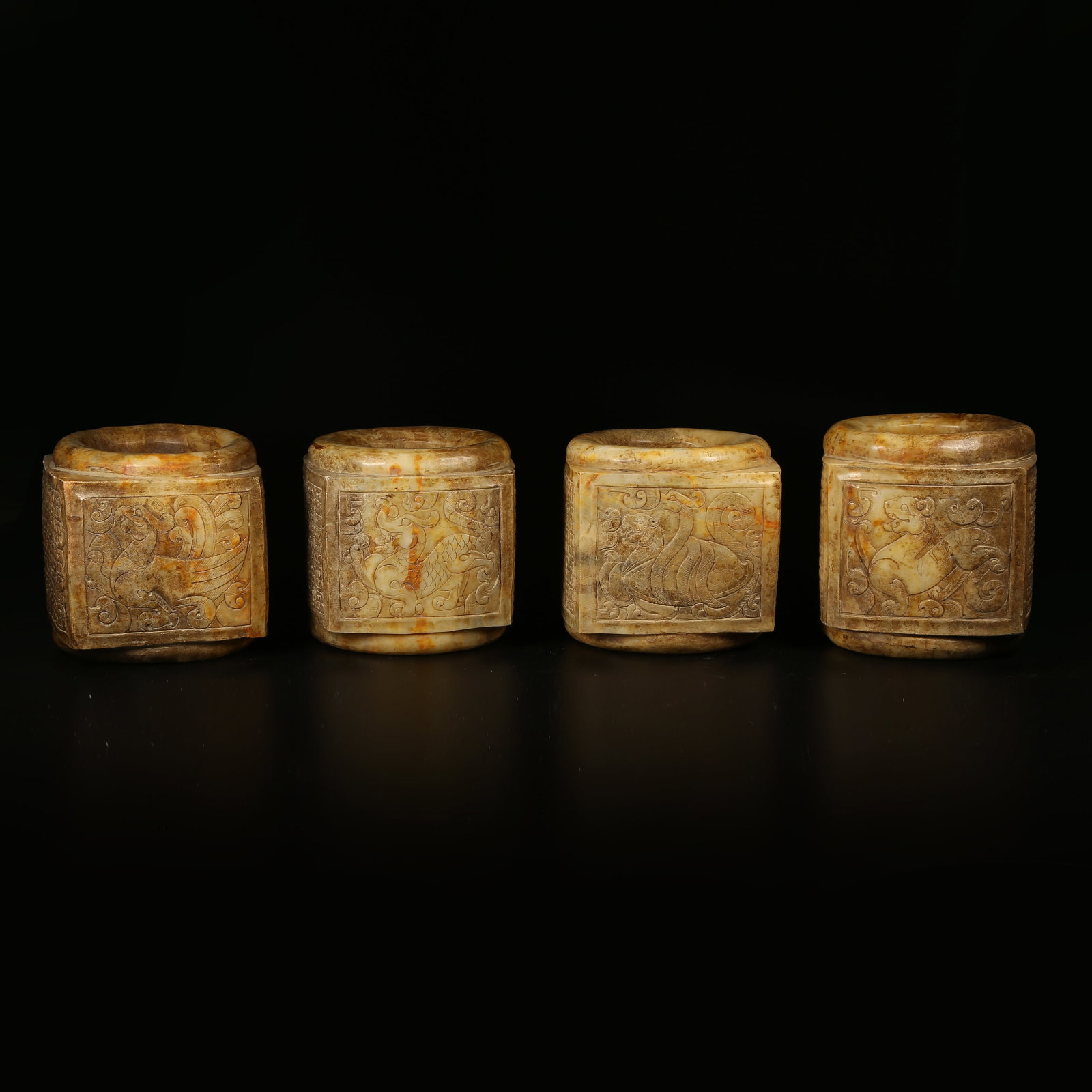 A ARCHAIC JADE CONG TUBES WITH FOUR DIVINE BEASTS DESIGN (SET) (1 of 10)