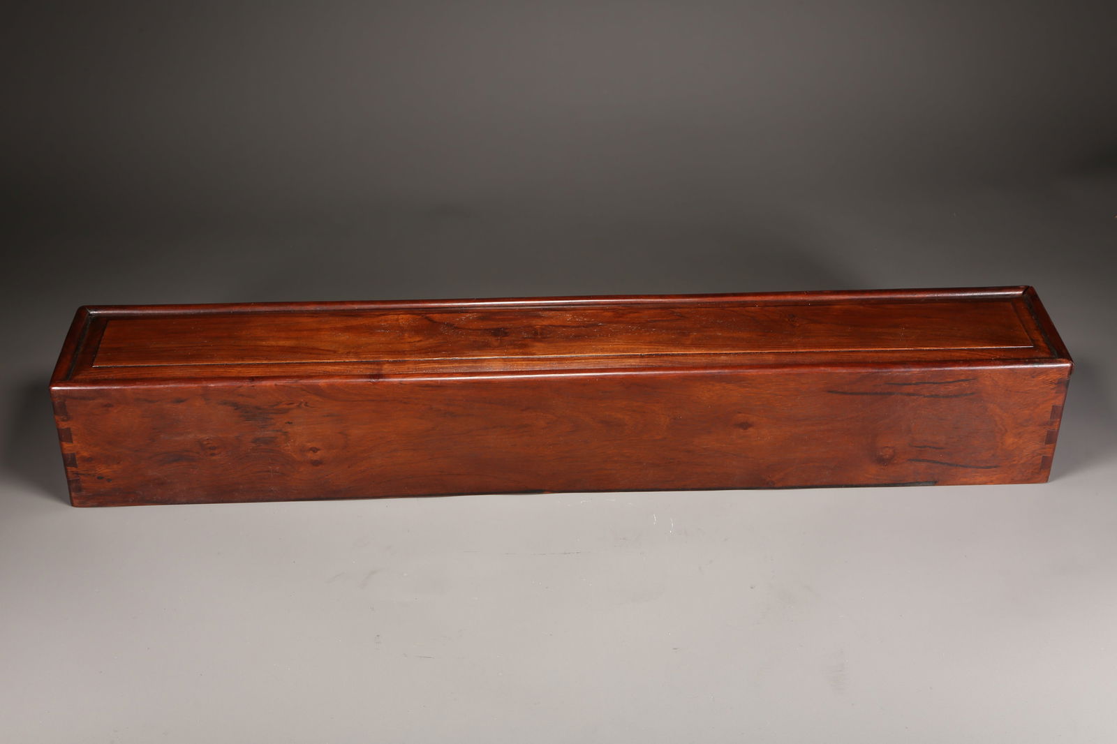 A HUANGHUALI RECTANGULAR LIDDED BOX - 9