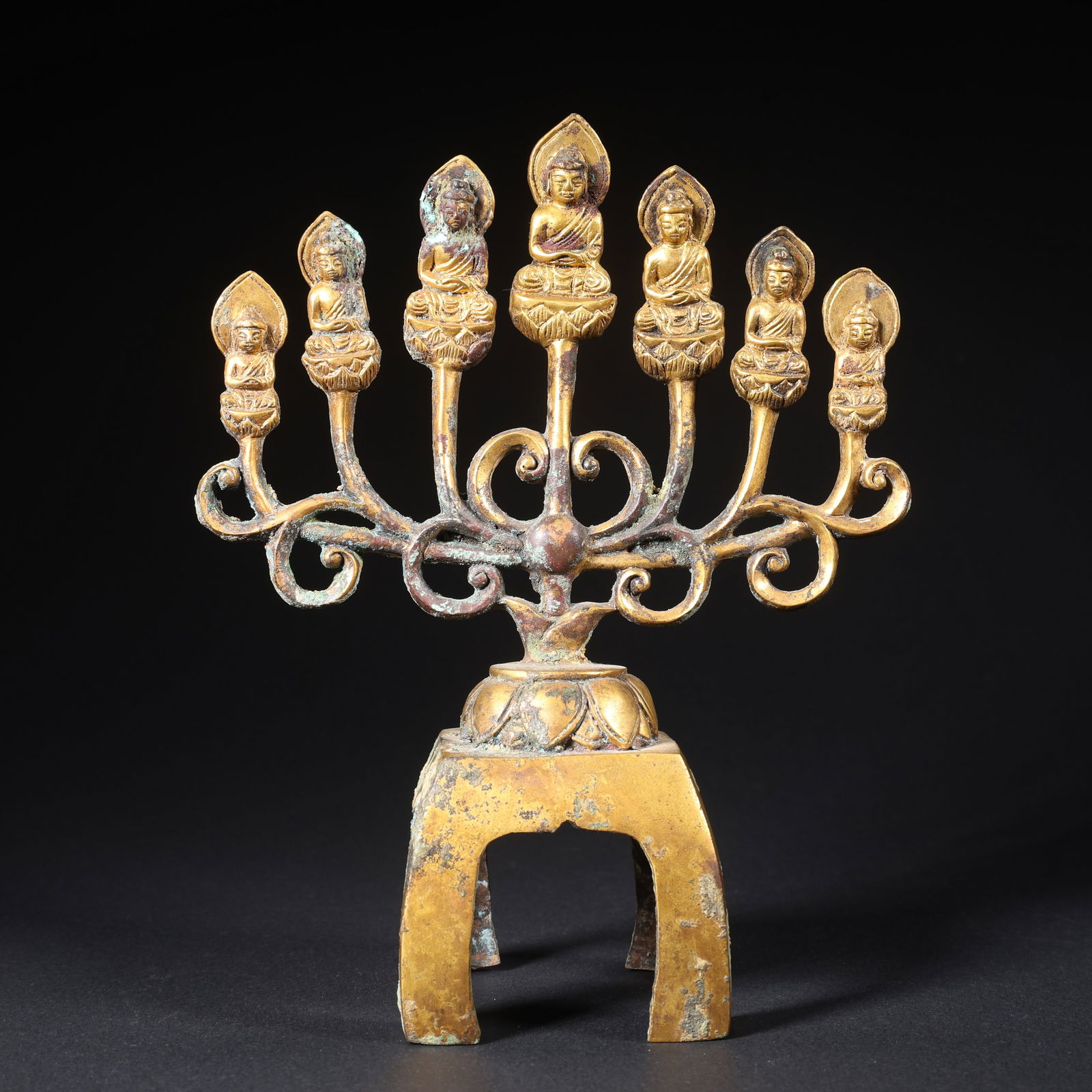 A GILT BRONZE SEVEN-BUDDHA GROUP (1 of 9)
