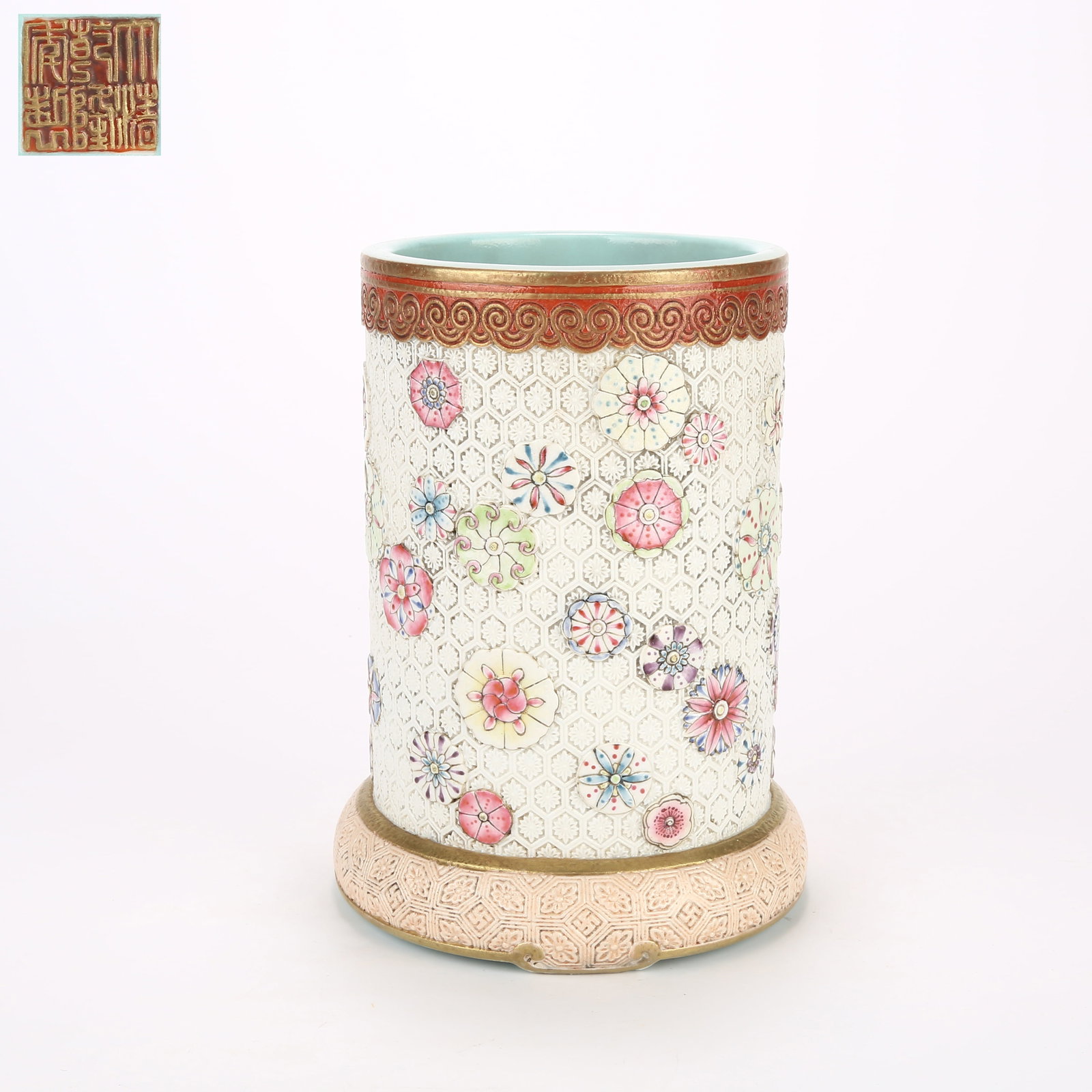 A CARVED FAMILLE-ROSE BRUSH POT WITH BALL-FLOWER PATTERN: Carved famille-rose brush pot with ball-flower pattern