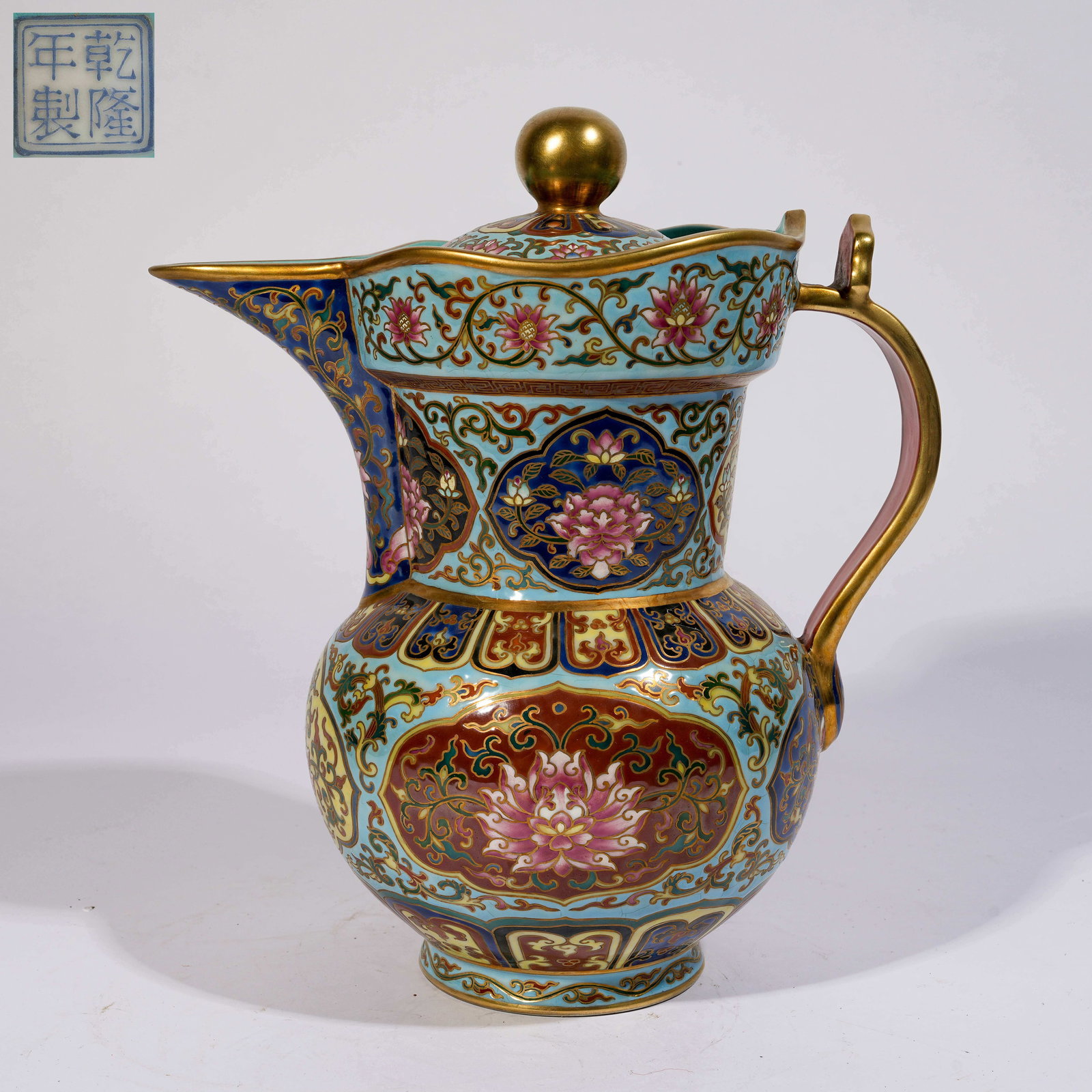 A TURQUOISE-GREEN GROUND ENAMEL MONK'S HAT TEAPOT WITH PASSIONFLOWER MOTIF (1 of 9)