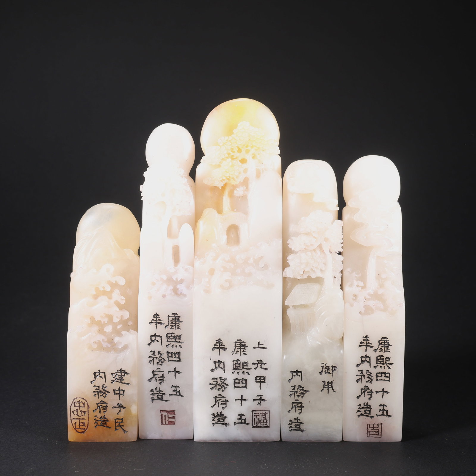 A SET OF FIVE WHITE TIANHUANG STONE LANDSCAPE SEALS (1 of 9)