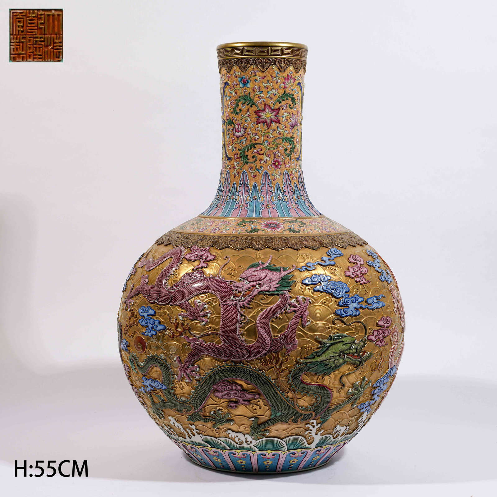 A CARVED PORCELAIN FAMILLE ROSE GLOBULAR VASE WITH CLOUD-AND-DRAGON MOTIF: Carved Porcelain Famille Rose Globular Vase with Cloud-and-Dragon Motif