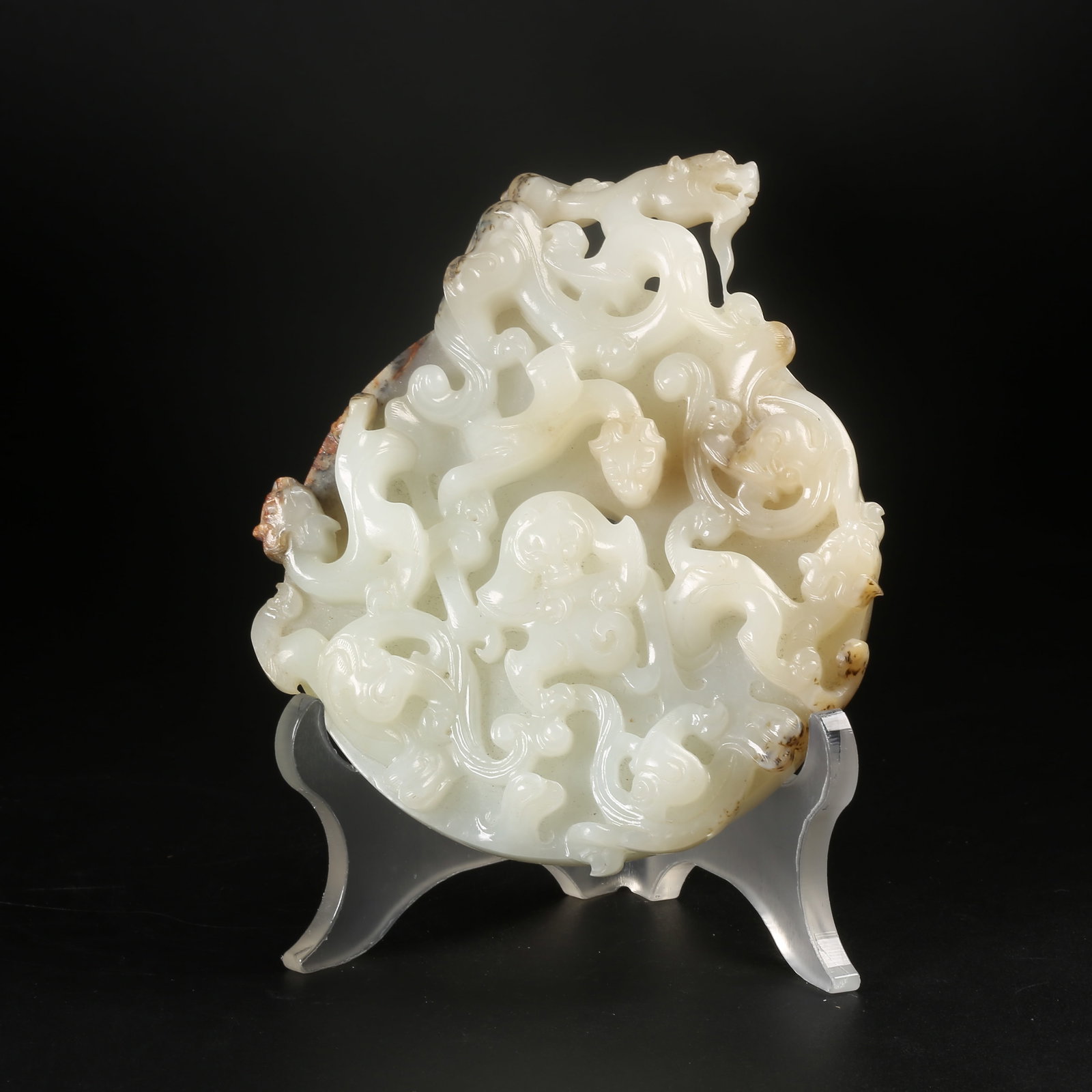 A ARCHAIC JADE BI DISK WITH DRAGON MOTIF (1 of 10)