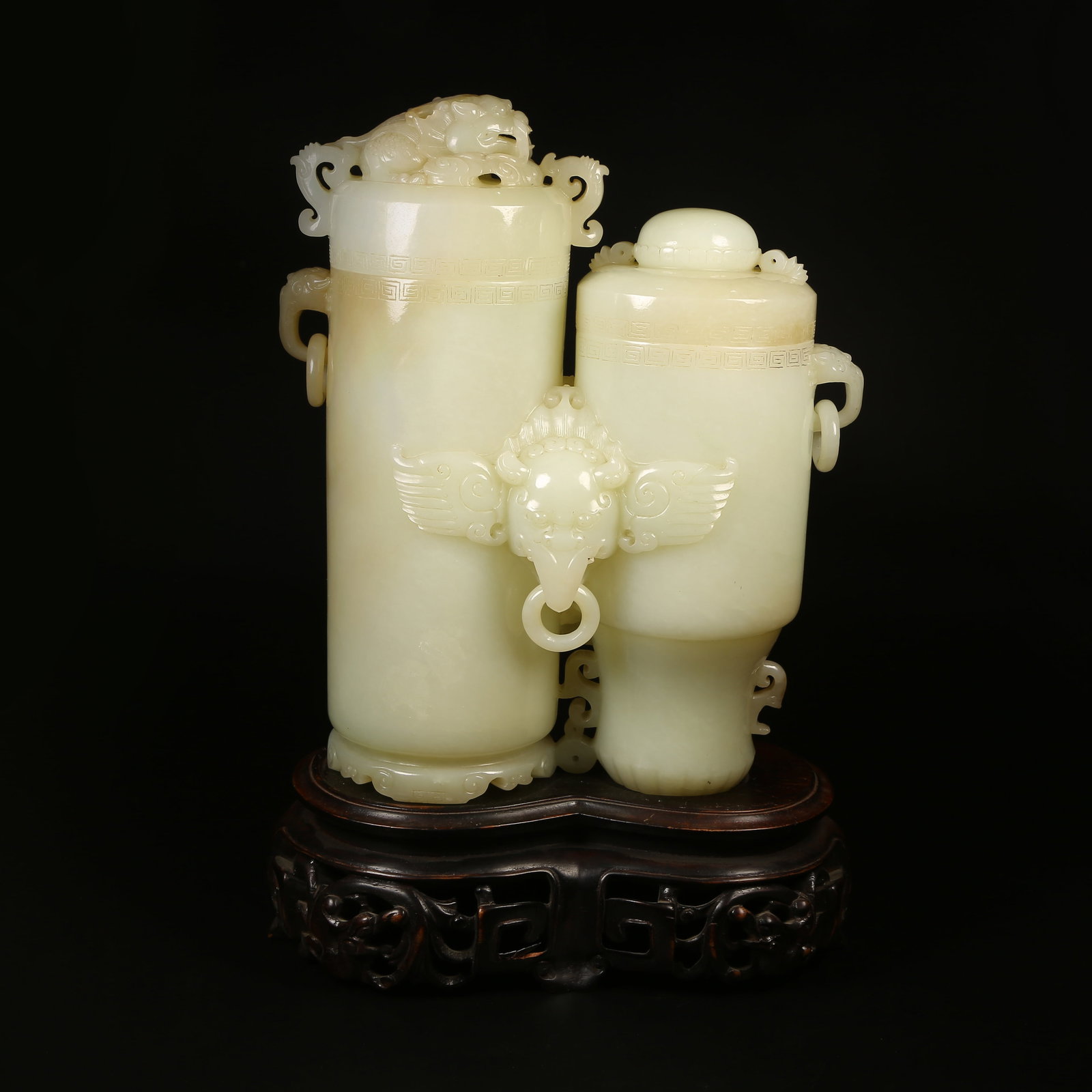 A HETIAN WHITE JADE DOUBLE-HANDLED VASE WITH BEAST-FORM HINGED HANDLES (1 of 10)