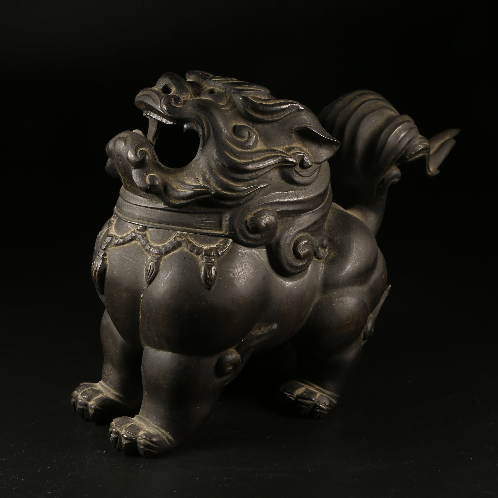A BRONZE AUSPICIOUS BEAST-SHAPED INCENSE BURNER (1 of 9)
