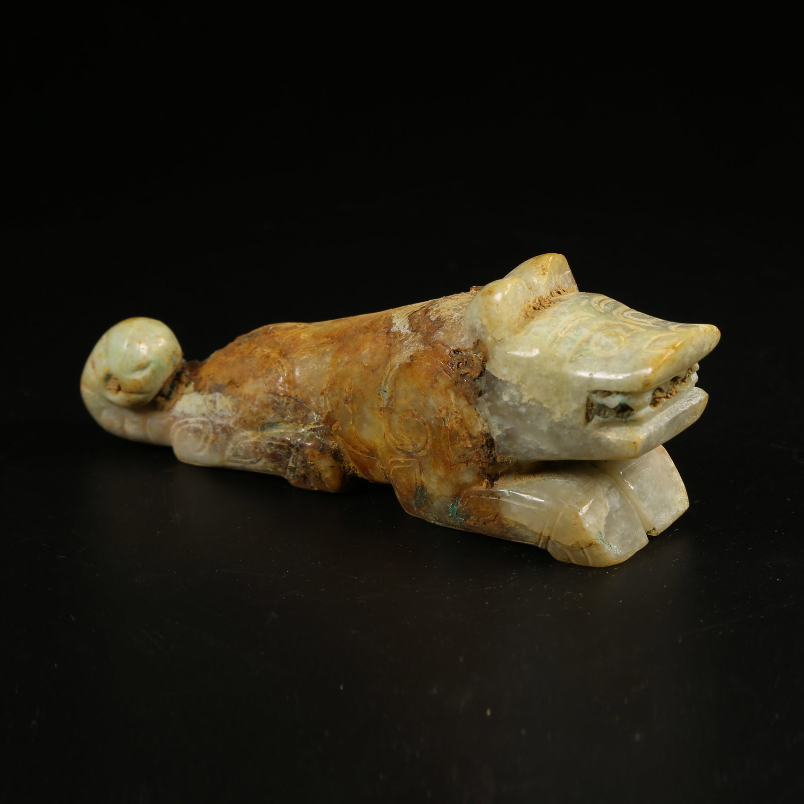 A ARCHAIC JADE AUSPICIOUS BEAST ORNAMENT (1 of 8)
