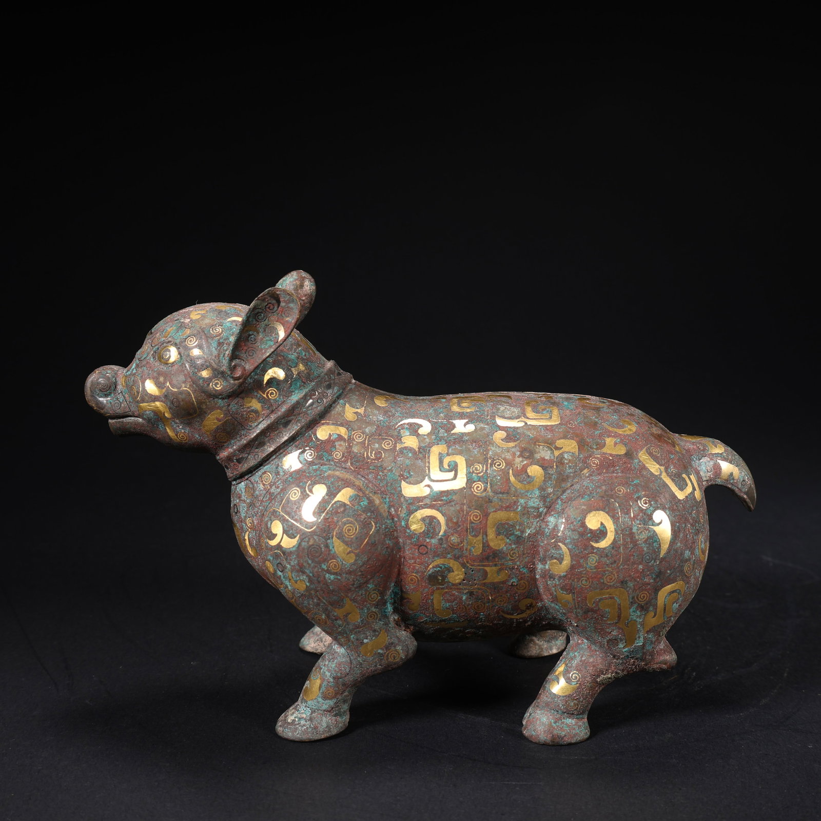 A BRONZE AUSPICIOUS BEAST WITH GOLD INLAY (1 of 9)