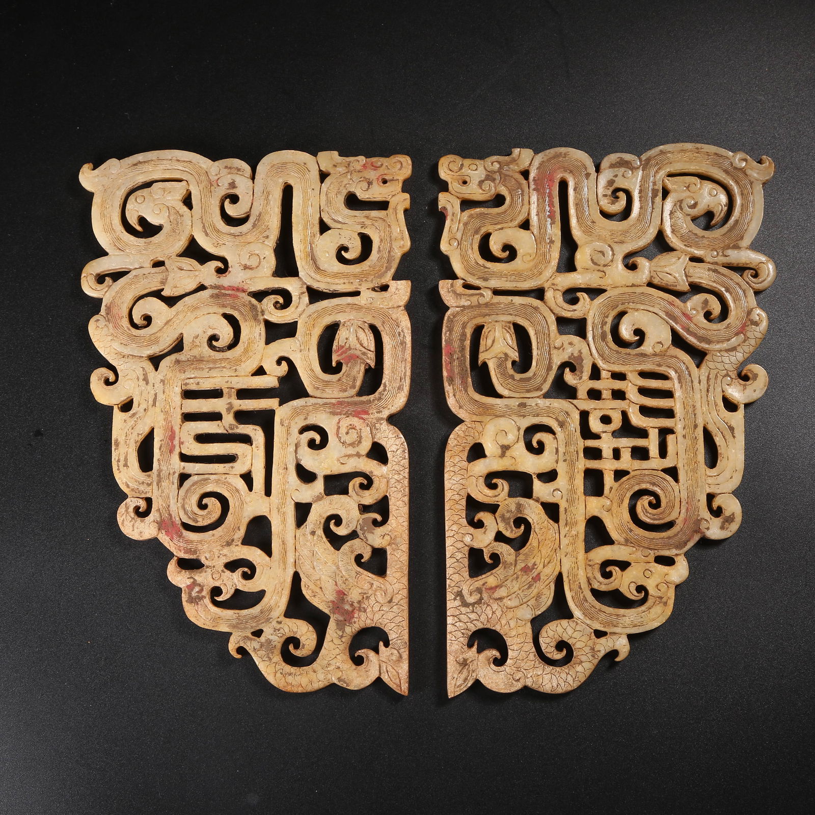 A ARCHAIC JADE CHI-DRAGON MOTIF PENDANT SET (1 of 9)