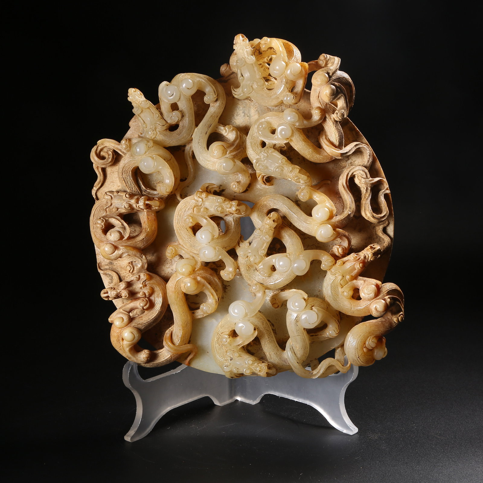 A ARCHAIC JADE DISC WITH CHI-DRAGON MOTIF (1 of 9)