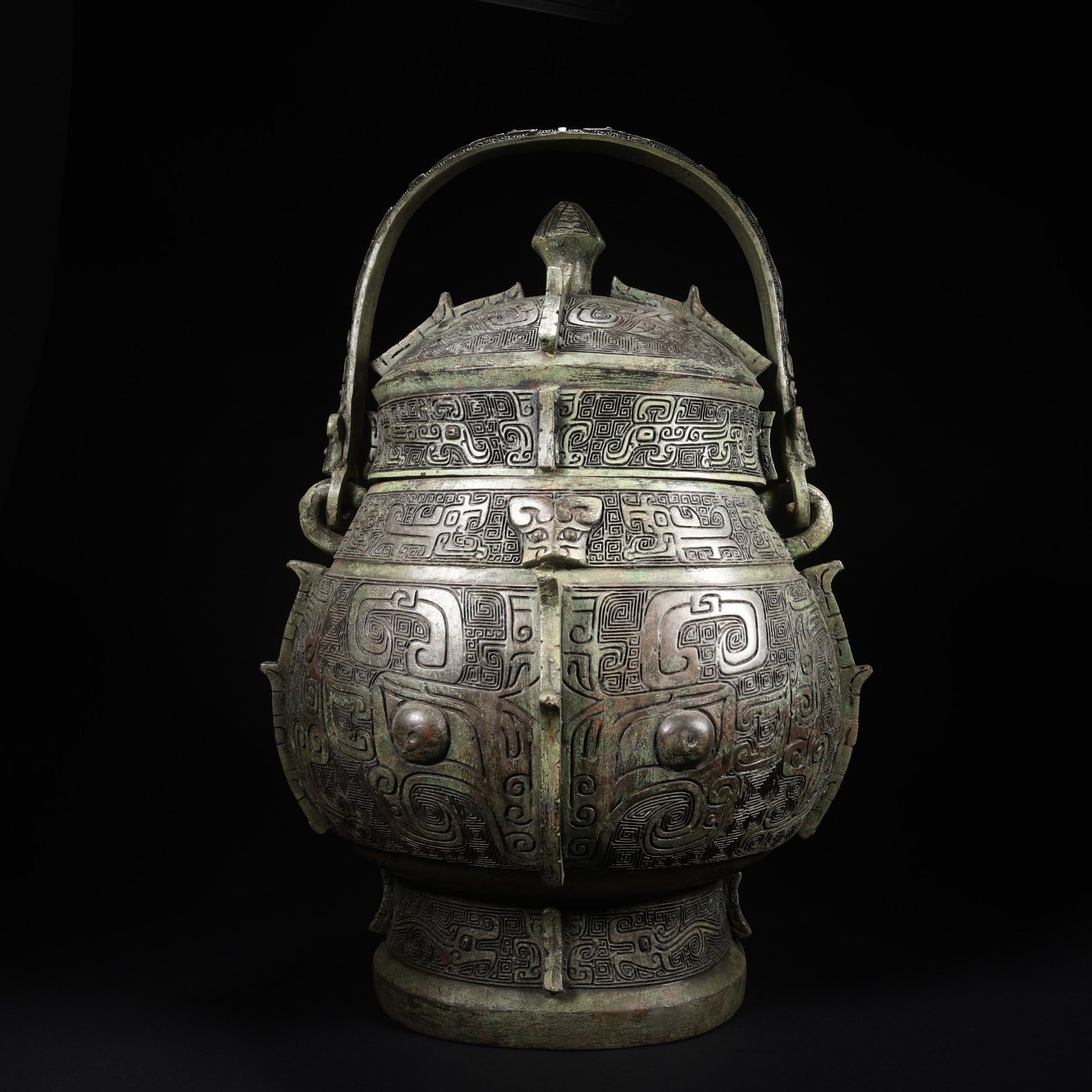 A BRONZE YOU VESSEL WITH SWING HANDLE (1 of 9)