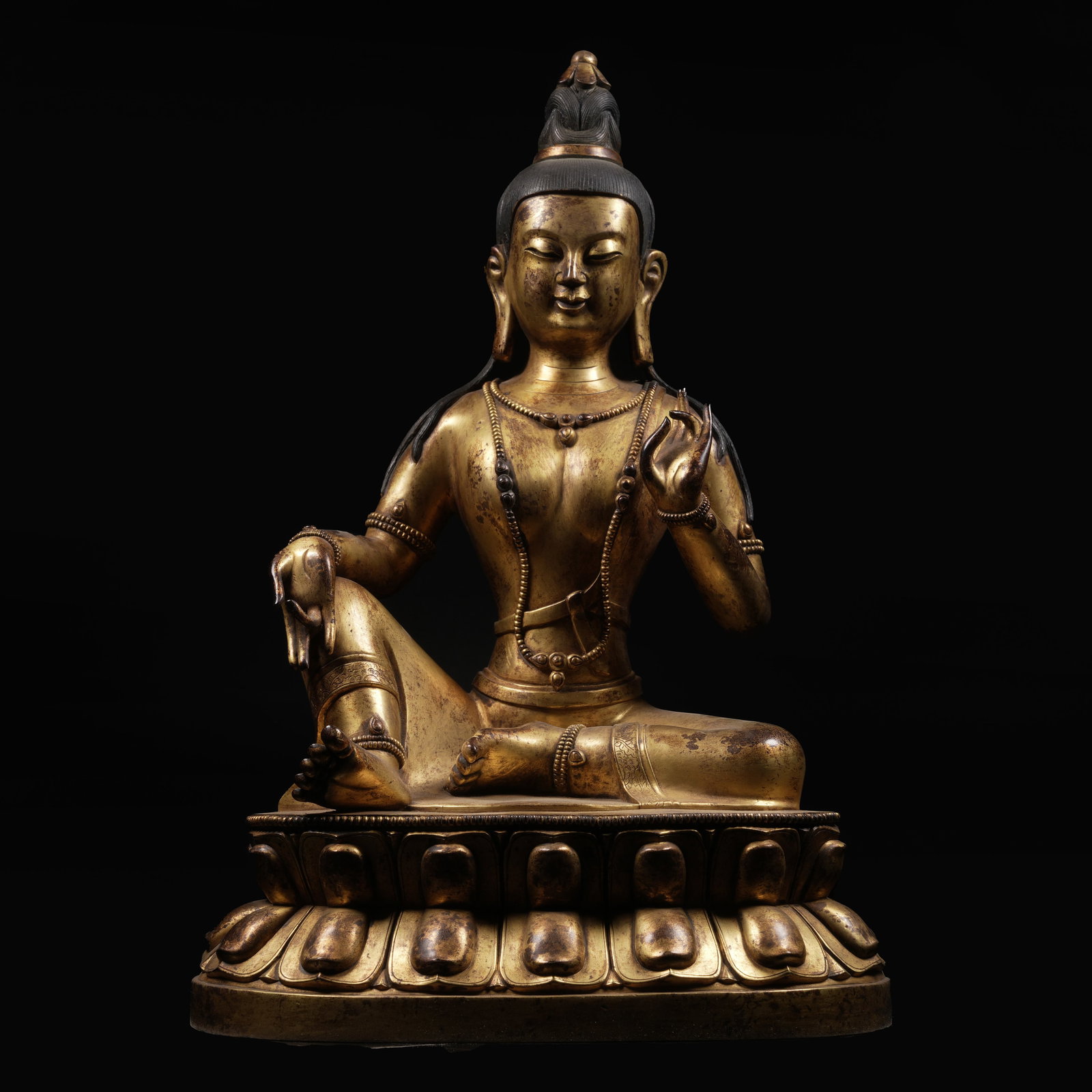 A GILT-BRONZE TARA STATUE (1 of 9)