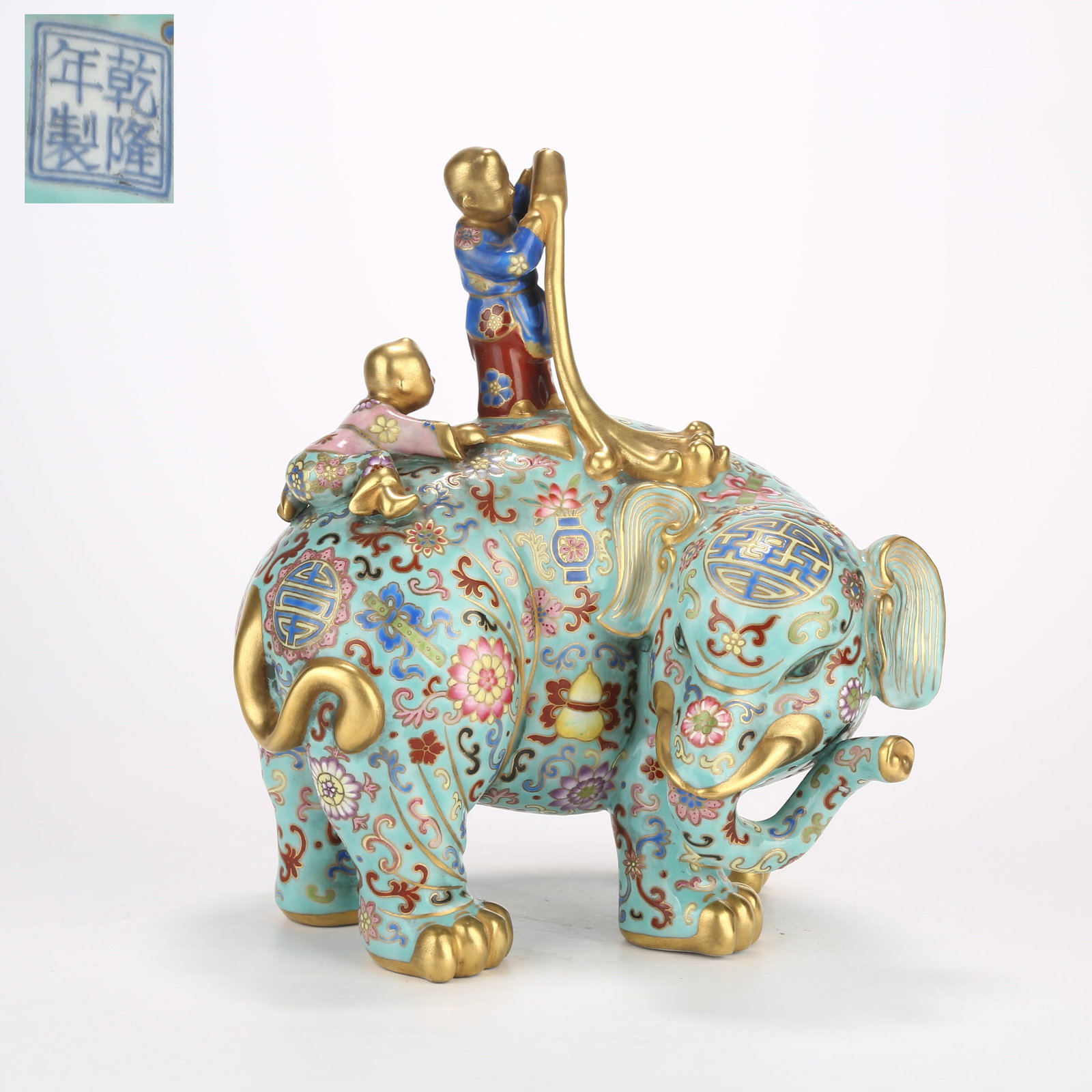 A TURQUOISE-GROUND ENAMELLED FIGURINE OF CHILDREN WASHING AN ELEPHANT (1 of 9)