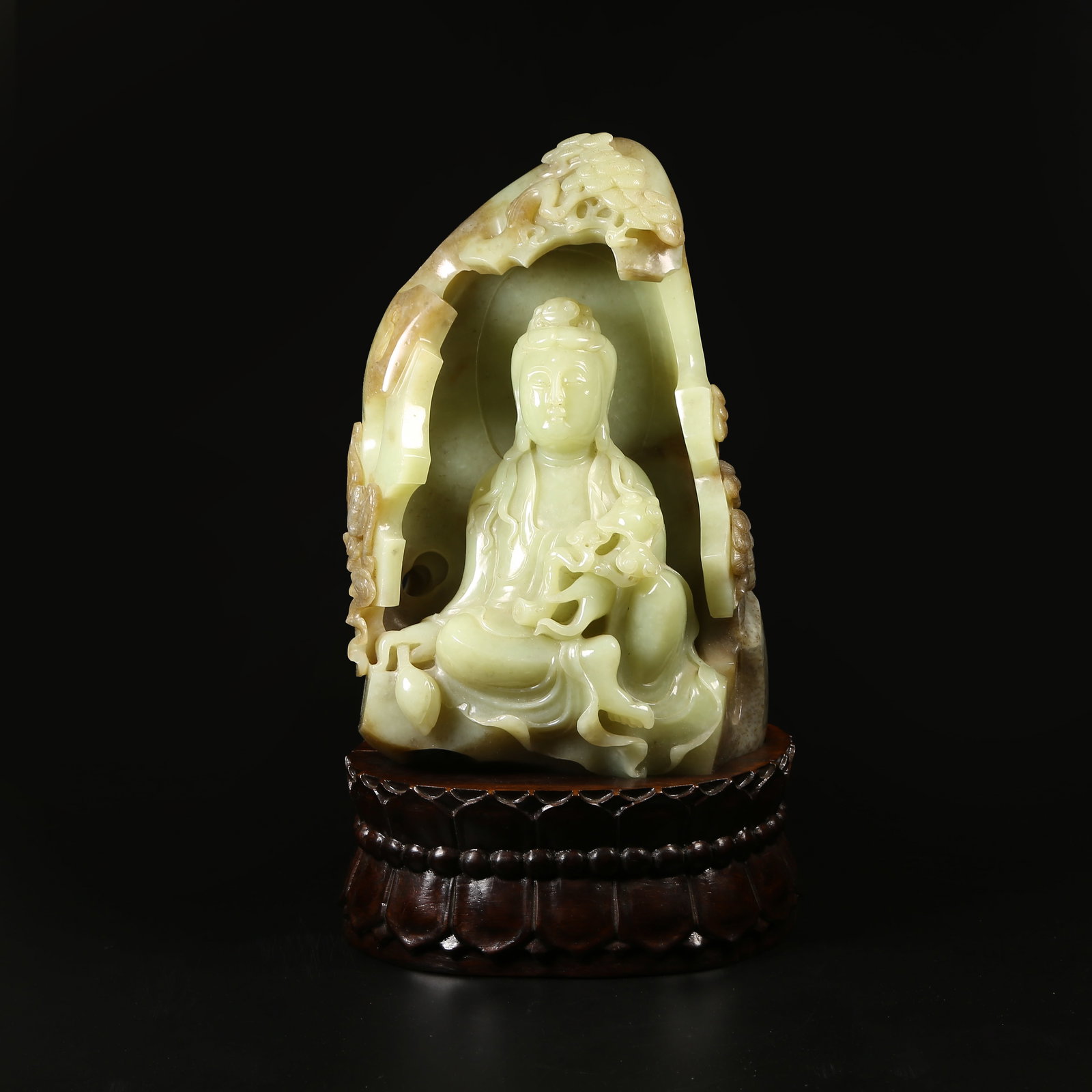 A HETIAN JADE MOUNTAIN-FORM ORNAMENT WITH SEATED GUANYIN BODHISATTVA (1 of 9)