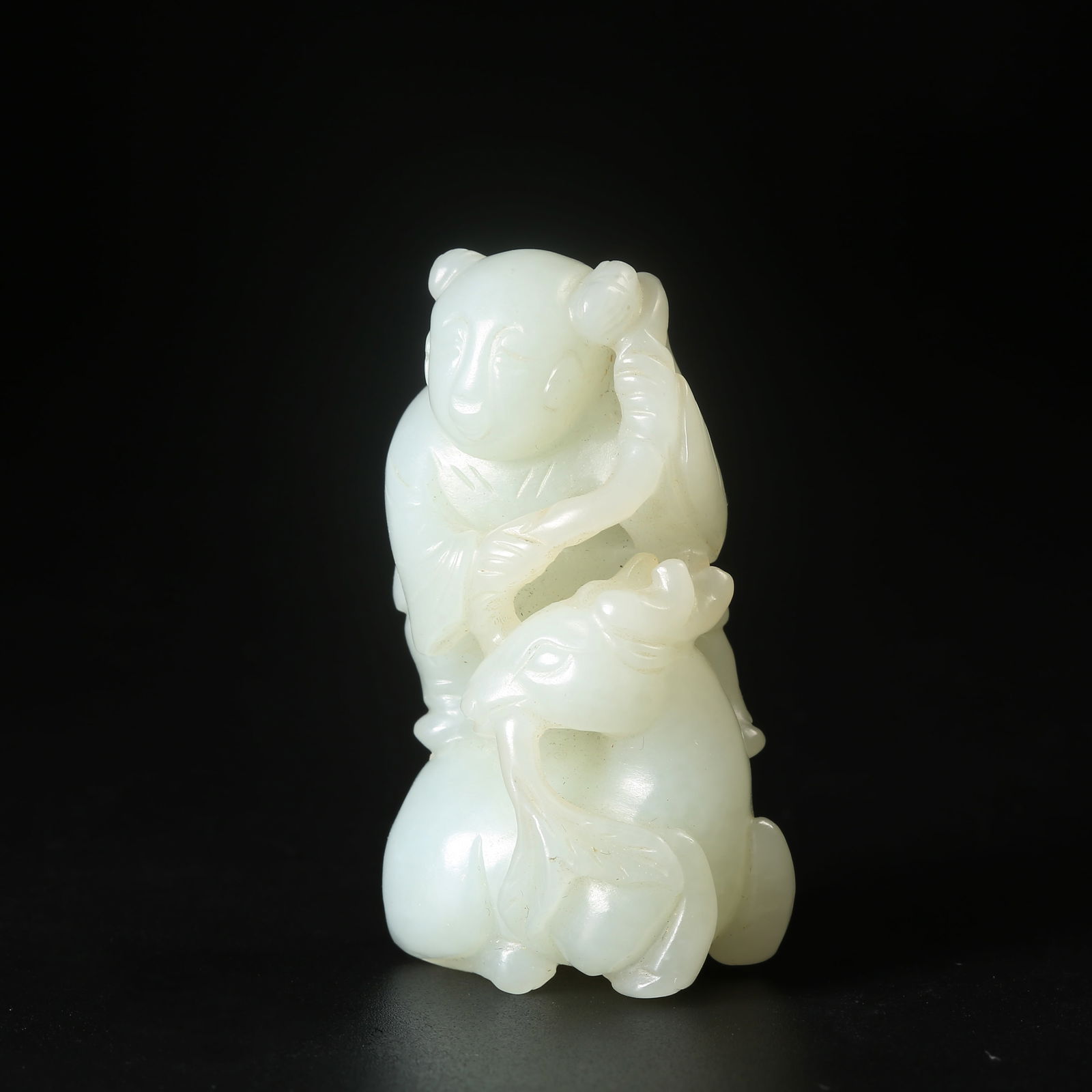 A HETIAN JADE "SPIRITUAL DEER AND BOY" TABLE ORNAMENT: Hetian Jade "Spiritual Deer and Boy" Table Ornament