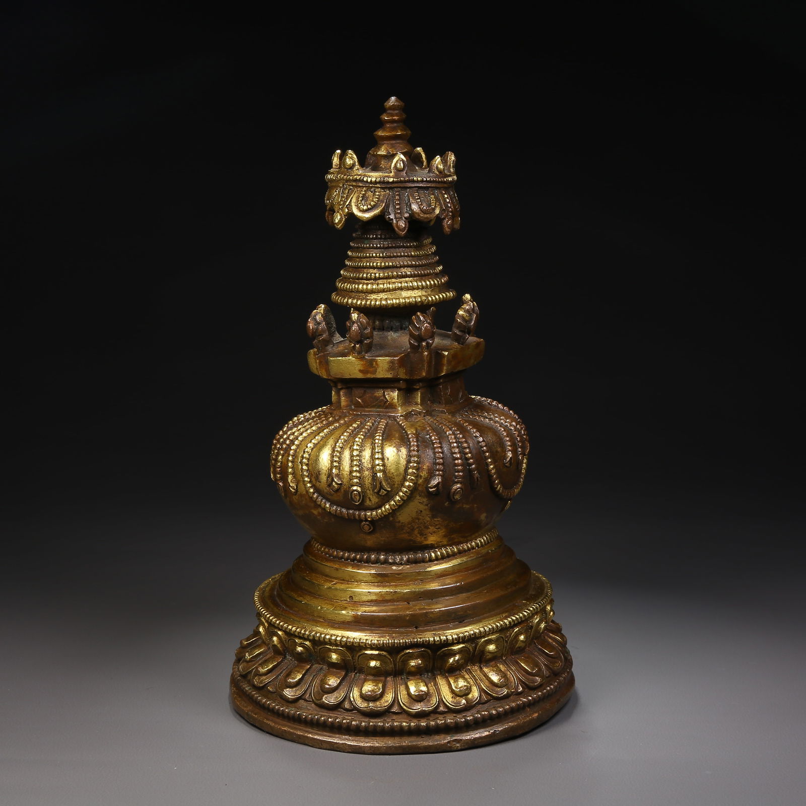A GILDED BRONZE STUPA (1 of 8)