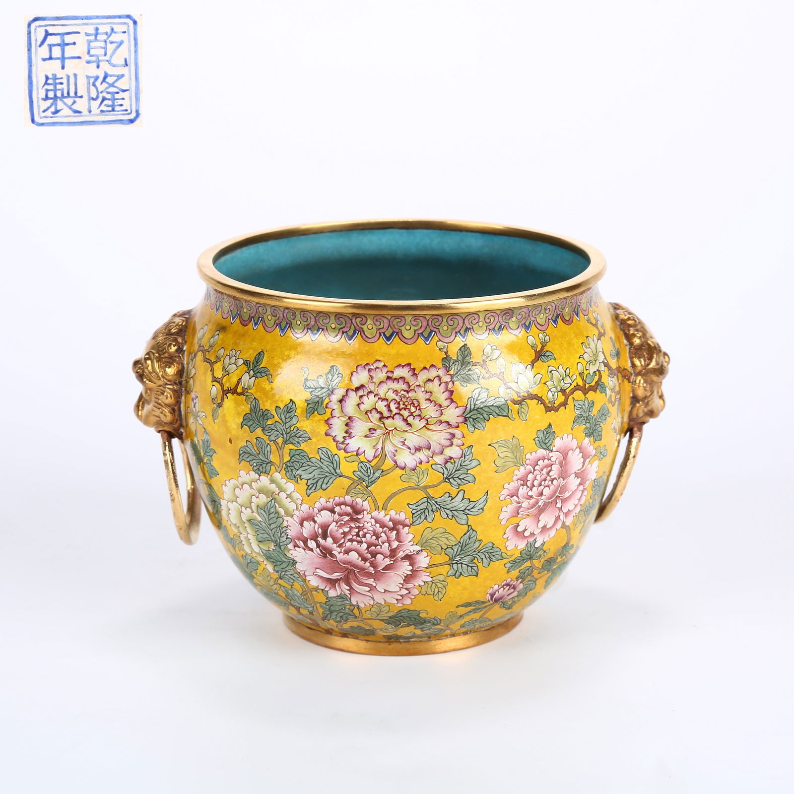 A CLOISONNÉ ENAMELED BASIN WITH PEONY MOTIF AND ANIMAL-MASK HANDLES: Cloisonné enameled basin with peony motif and animal-mask handles