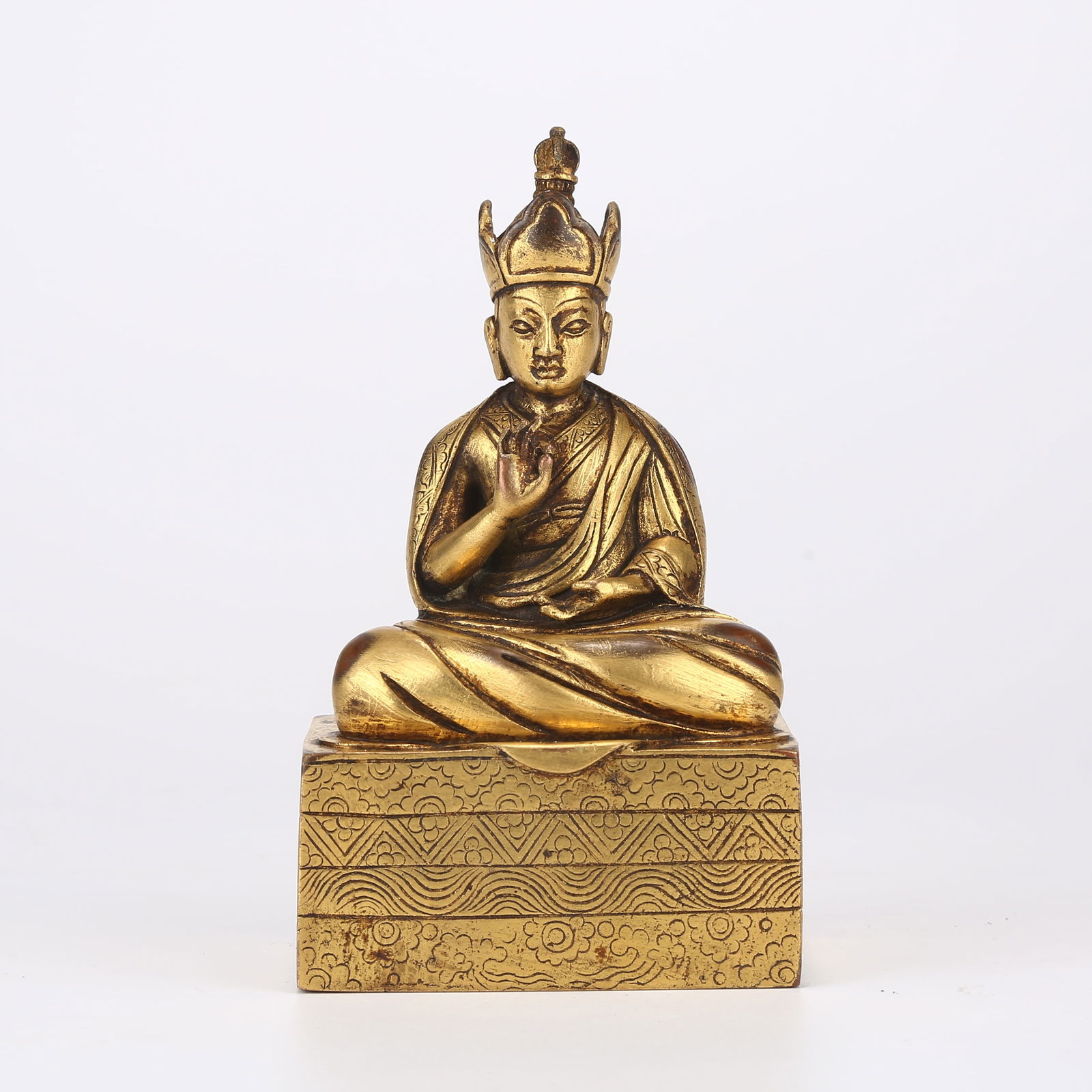 A GILDED BRONZE STATUE OF PADMASAMBHAVA: Gilded bronze statue of Padmasambhava