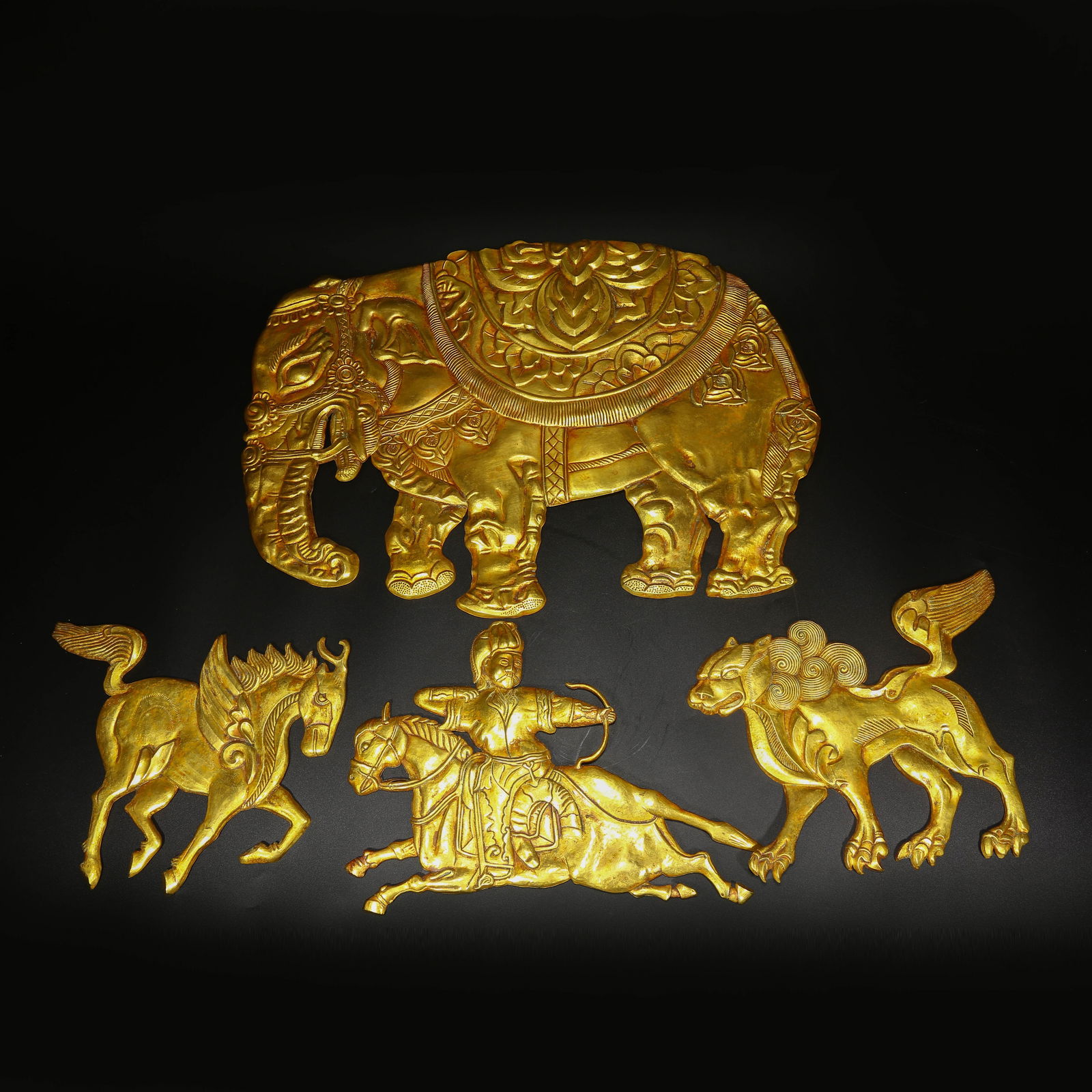 A SET OF GILT BRONZE PLAQUES (1 of 9)