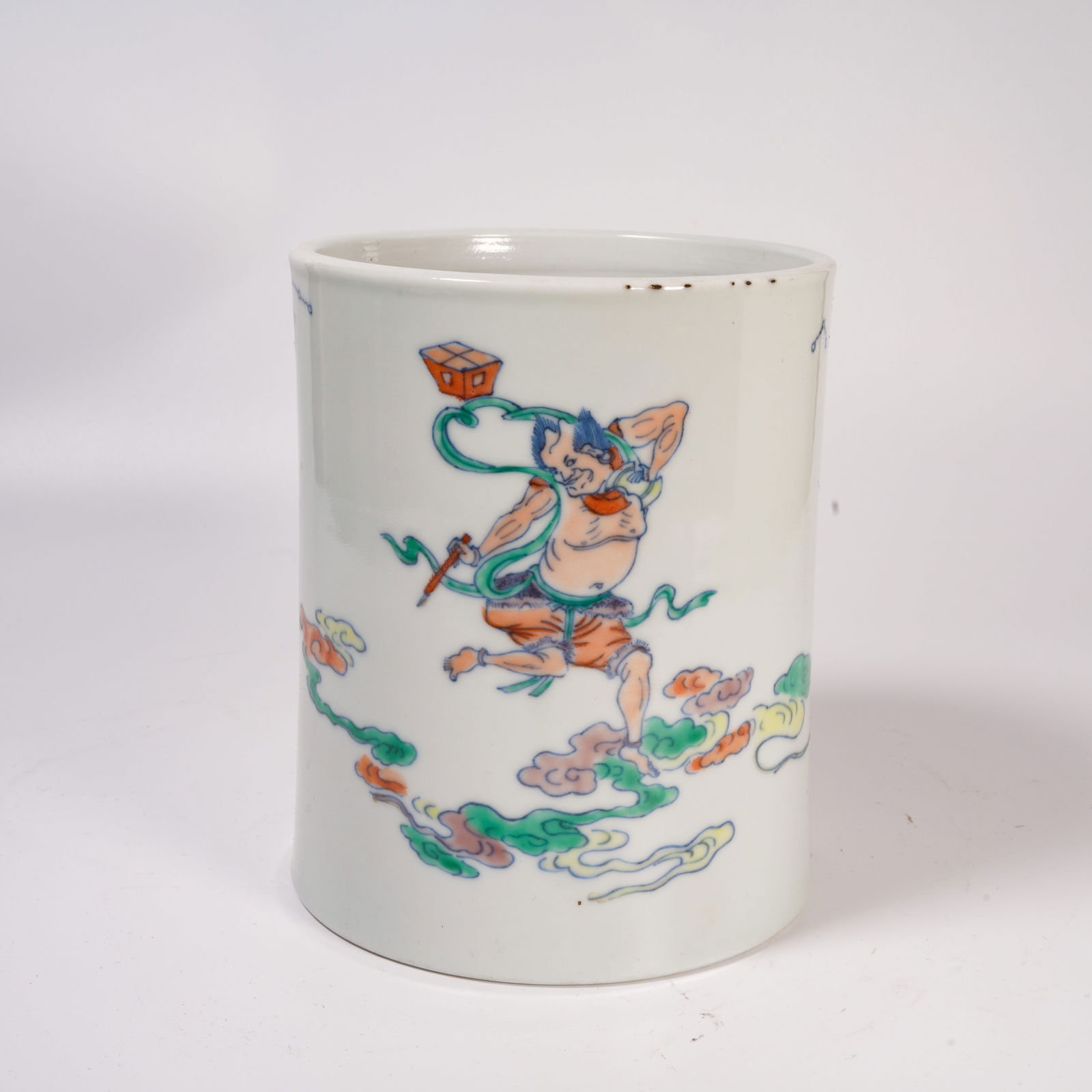 A DOUCAI BRUSH HOLDER WITH "KUI XING POINTS THE DIPPER" MOTIF: Doucai Brush Holder with "Kui Xing Points the Dipper" Motif