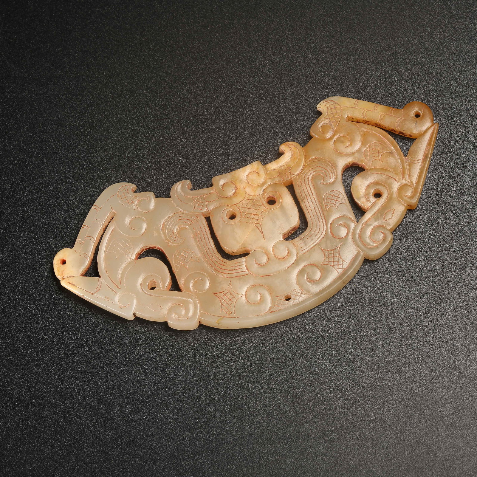 A ARCHAIC JADE HUANG WITH ANIMAL-MASK MOTIF: Archaic Jade Huang with Animal-Mask Motif