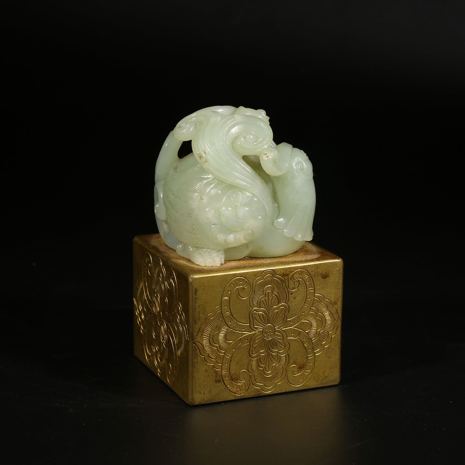 A GILT BRONZE SEAL WITH BEAST KNOB INLAID WITH HETIAN JADE: Gilt Bronze Seal with Beast Knob Inlaid with Hetian Jade