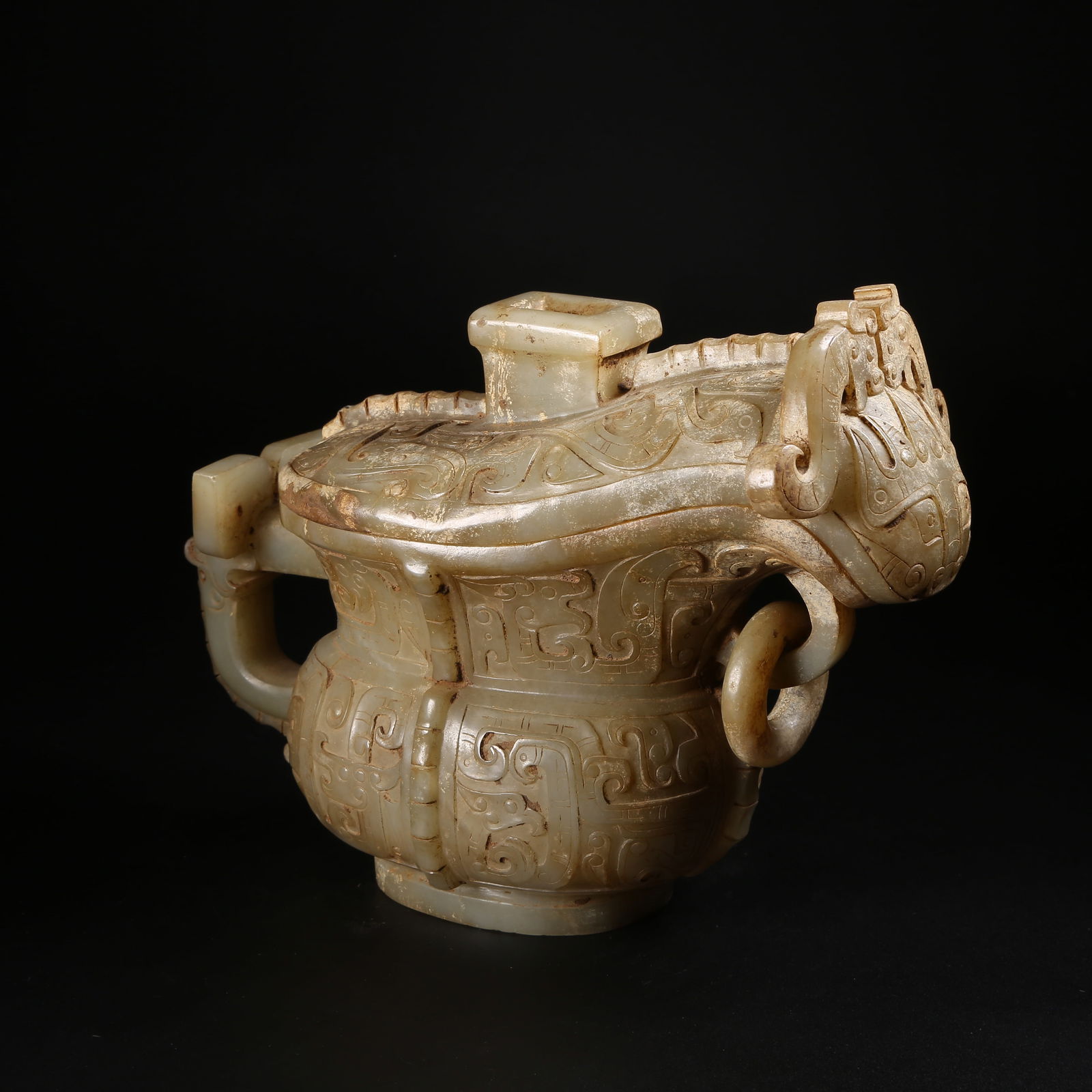 A ARCHAIC JADE GONG CUP WITH BEAST-FACE MOTIFS (1 of 8)