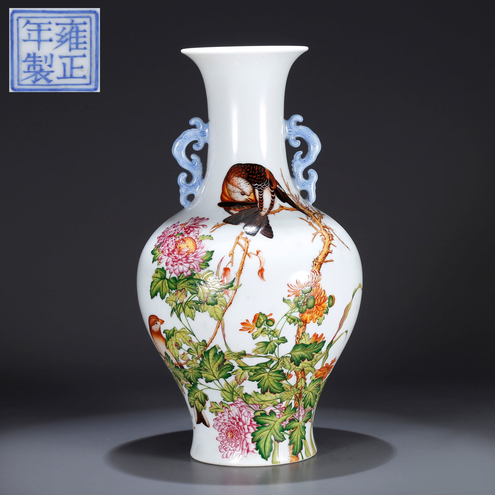 A FAMILLE ROSE DOUBLE-HANDLED VASE WITH FLORAL AND BIRD DESIGN: Famille rose double-handled vase with floral and bird design