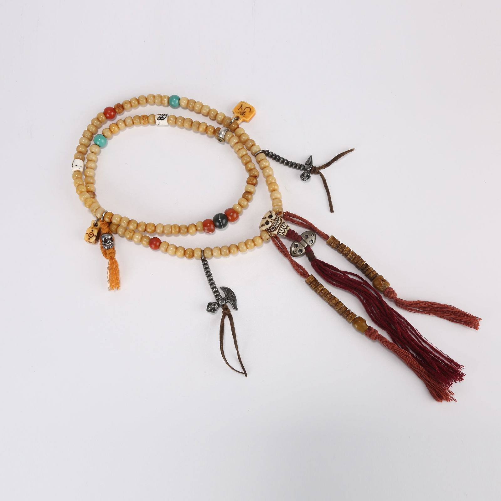 A STRAND OF BONE PRAYER BEADS: One strand of bone prayer beads