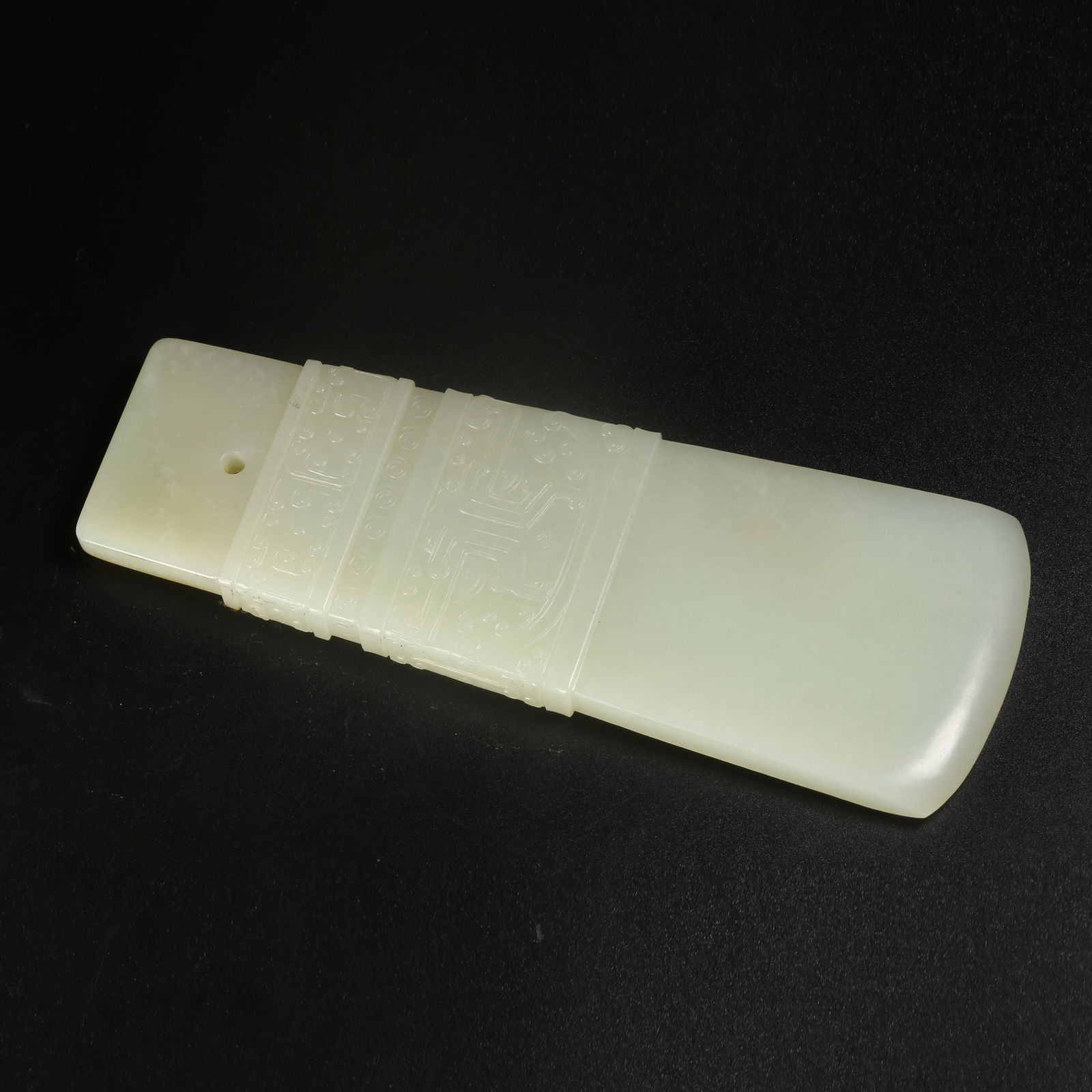 A HETIAN JADE BEAST-FACE PATTERN AXE (1 of 9)