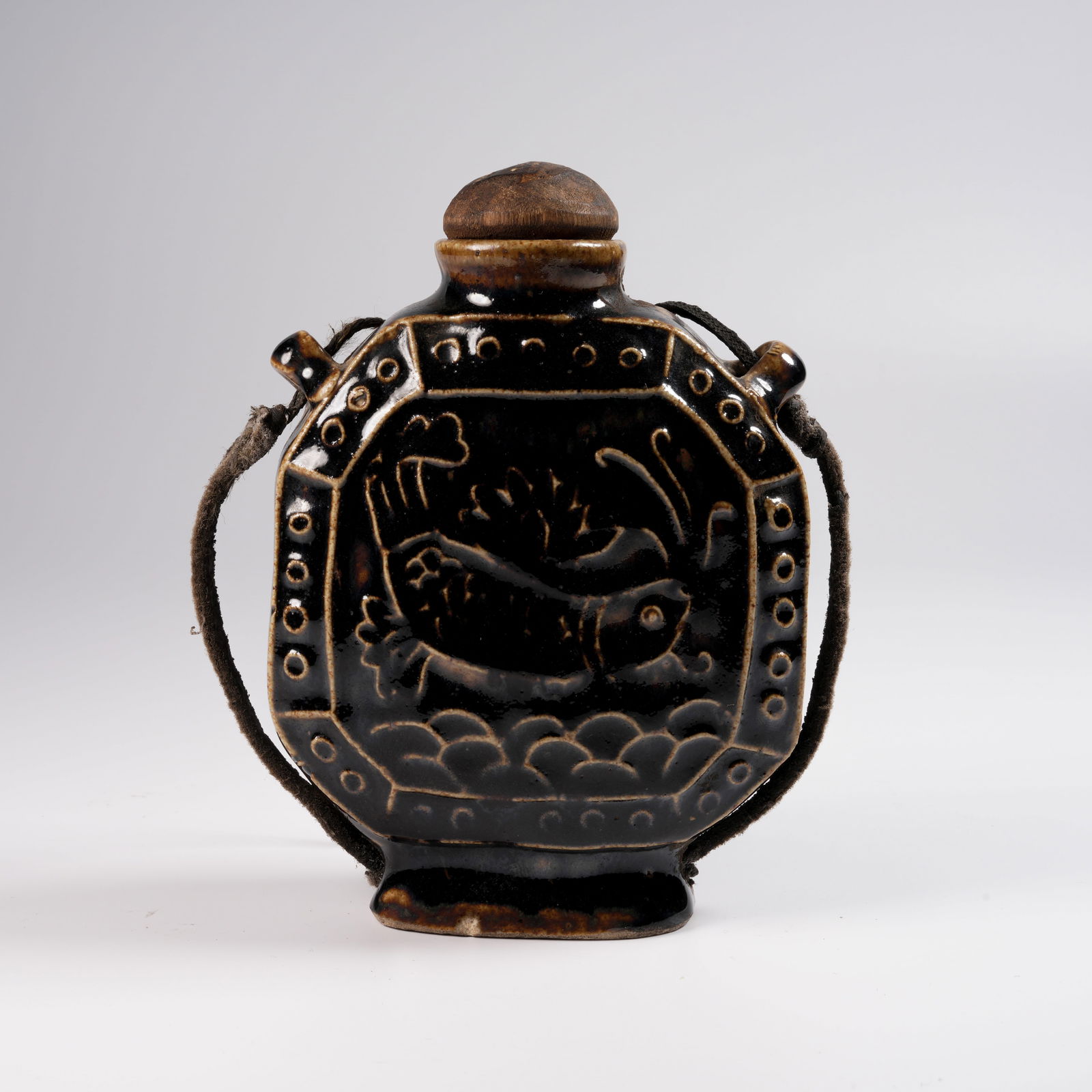 A DING WARE "ABUNDANCE YEAR AFTER YEAR" MOTIF PILGRIM BOTTLE: Ding Ware "Abundance Year After Year" Motif Pilgrim Bottle