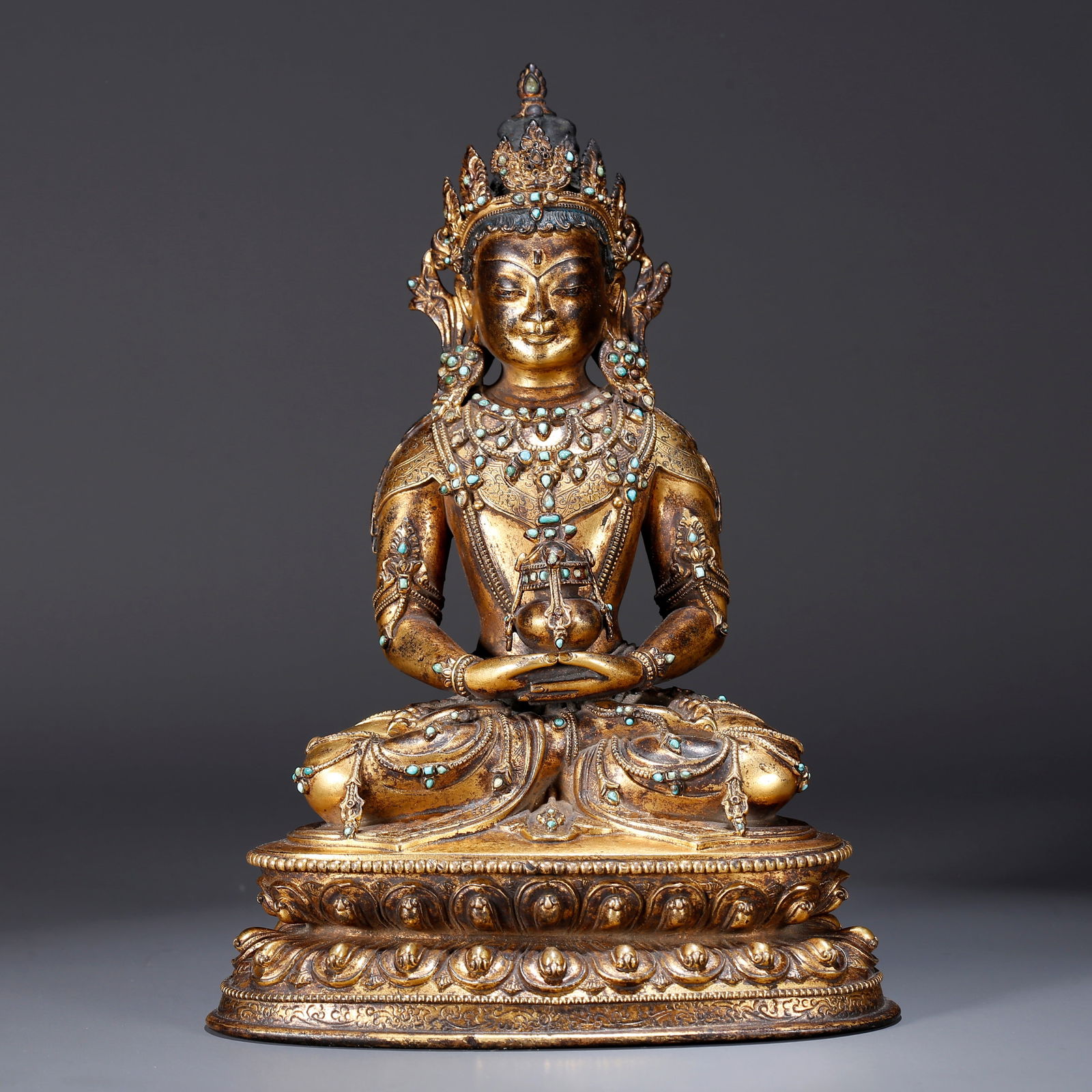 A BRONZE GILT LONGEVITY BUDDHA STATUE (1 of 10)