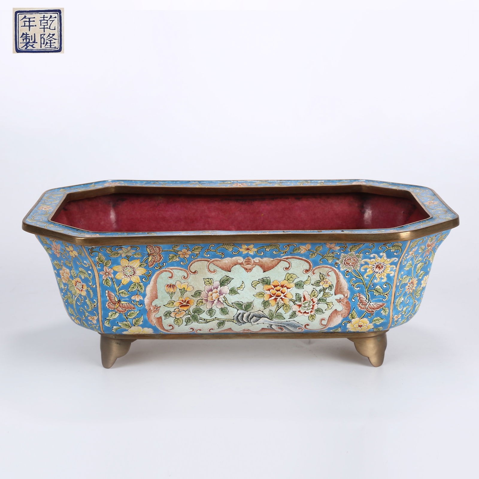 A CLOISONNÉ ENAMELED NARCISSUS BASIN WITH FLORAL AND FRUIT MOTIF: Cloisonné enameled narcissus basin with floral and fruit motif