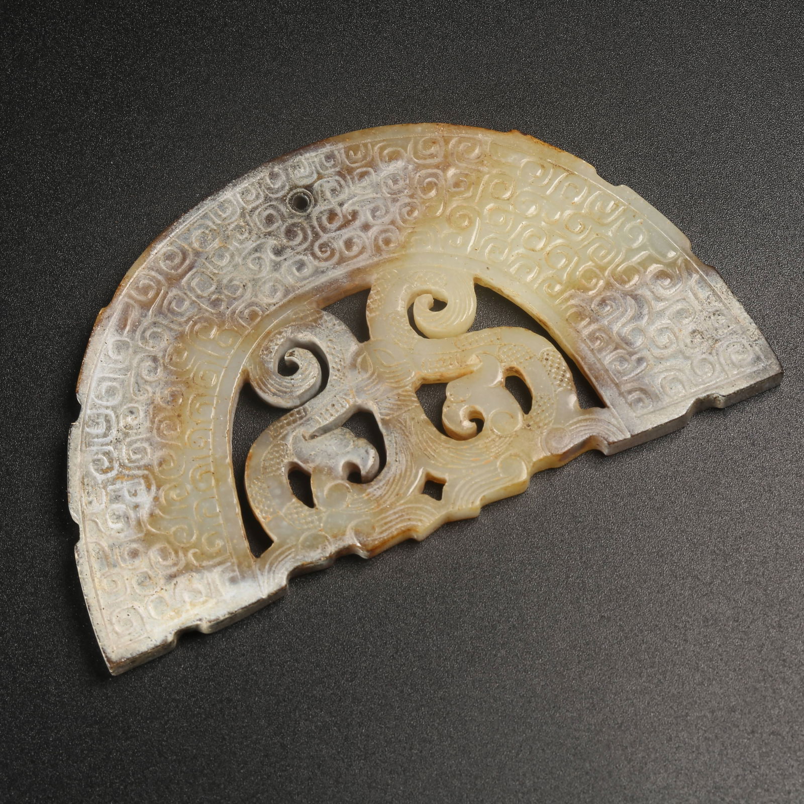 A ARCHAIC JADE HUANG WITH TWIN-DRAGON MOTIF (1 of 9)