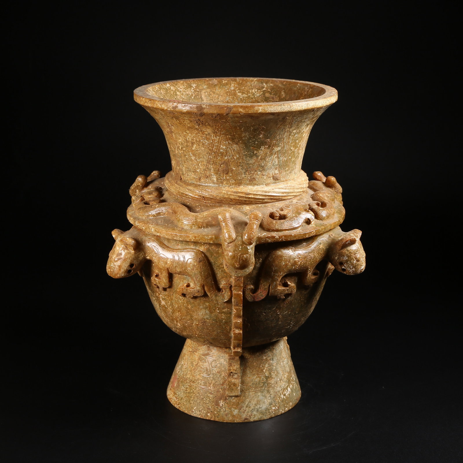 A ARCHAIC JADE ZUN RITUAL VESSEL WITH DRAGON MOTIFS (1 of 9)