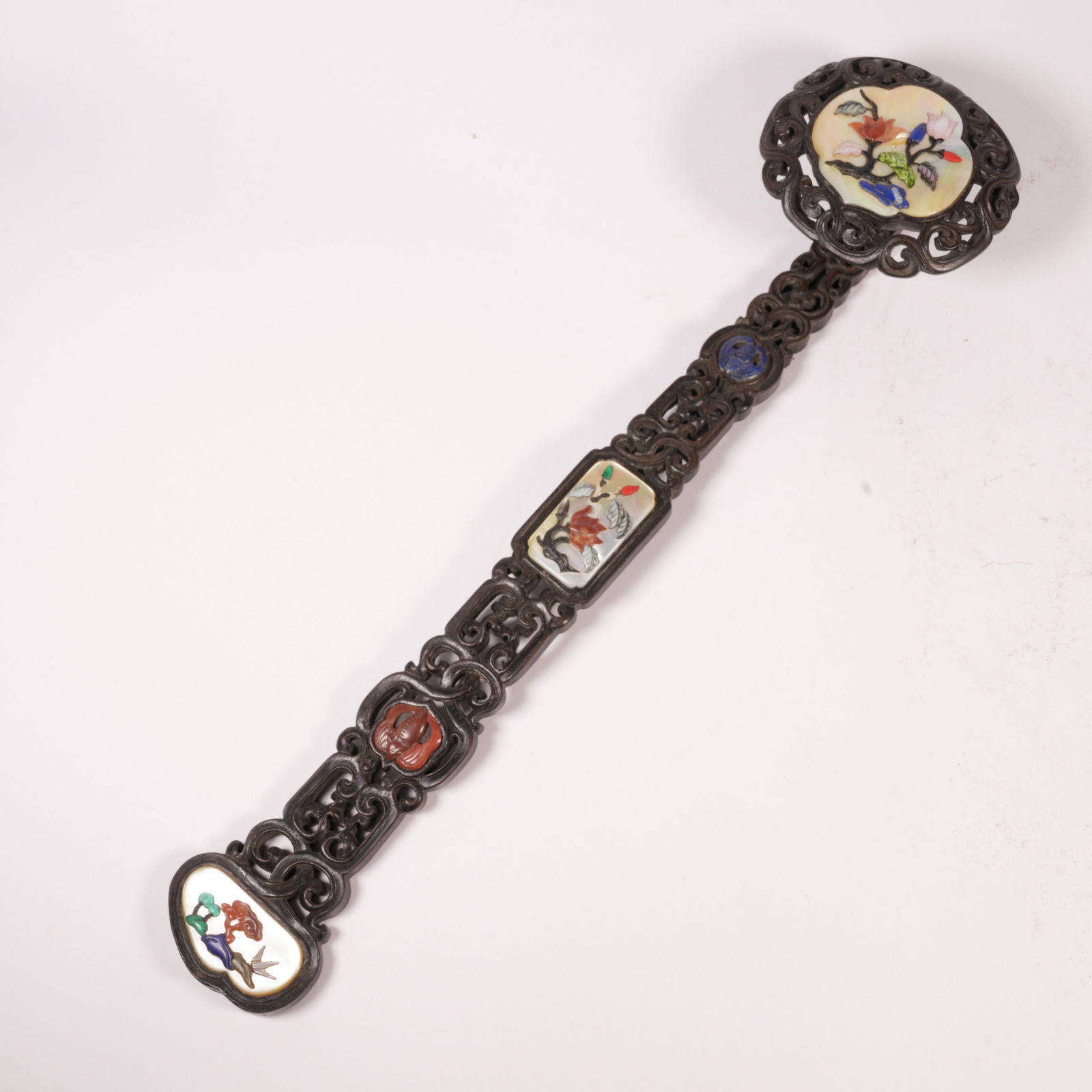 A ZITAN RUYI INLAID WITH MOTHER-OF-PEARL AND "HUNDRED TREASURES": Zitan Ruyi Inlaid with Mother-of-Pearl and "Hundred Treasures"