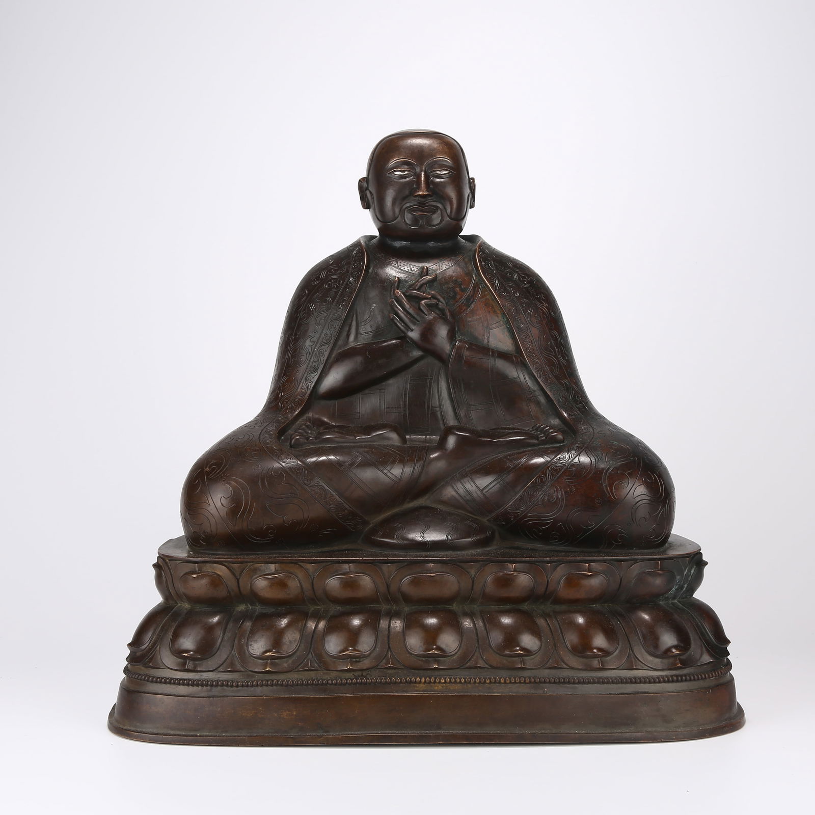 A ALLOY BRONZE AND SILVER INLAID GURU STATUE (1 of 8)