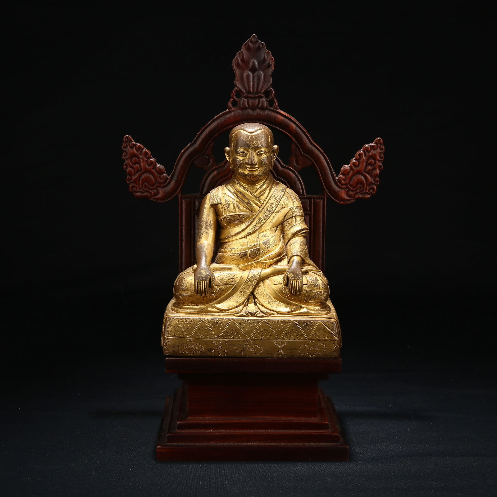 A GILT BRONZE LAMA STATUE: Gilt Bronze Lama Statue