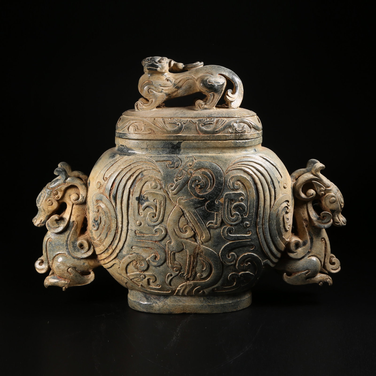 A ARCHAIC JADE EWER WITH DRAGON MOTIFS: Archaic jade ewer with dragon motifs